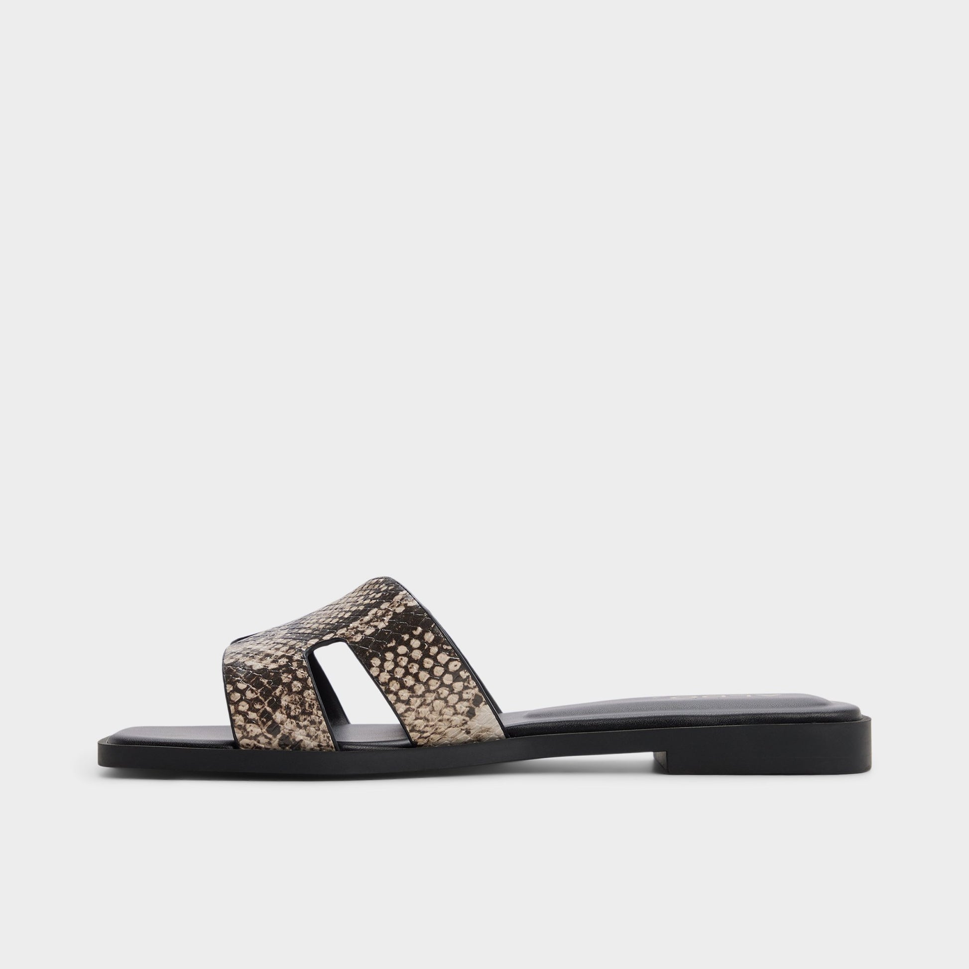 Side view of Open brown Itsandal Slide sandal