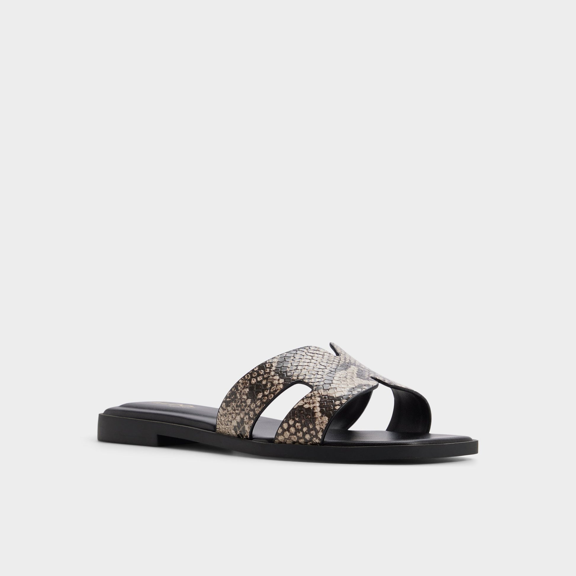 Three-quarter angle of Open brown Itsandal Slide sandal's front side