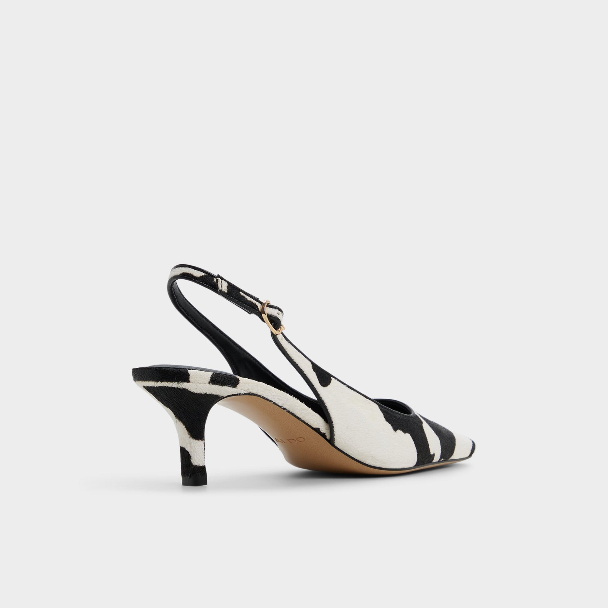 Three-quarter angle of White/black Gabriellie Slingback high heel's back side