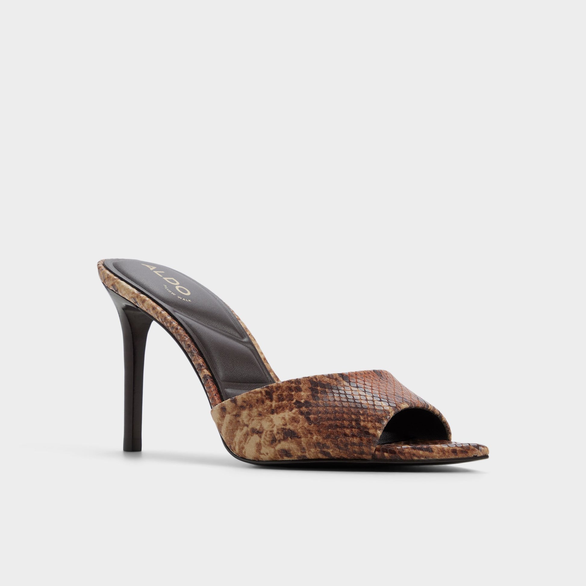 Three-quarter angle of Brown multi Anniebrilden Heeled mule's front side