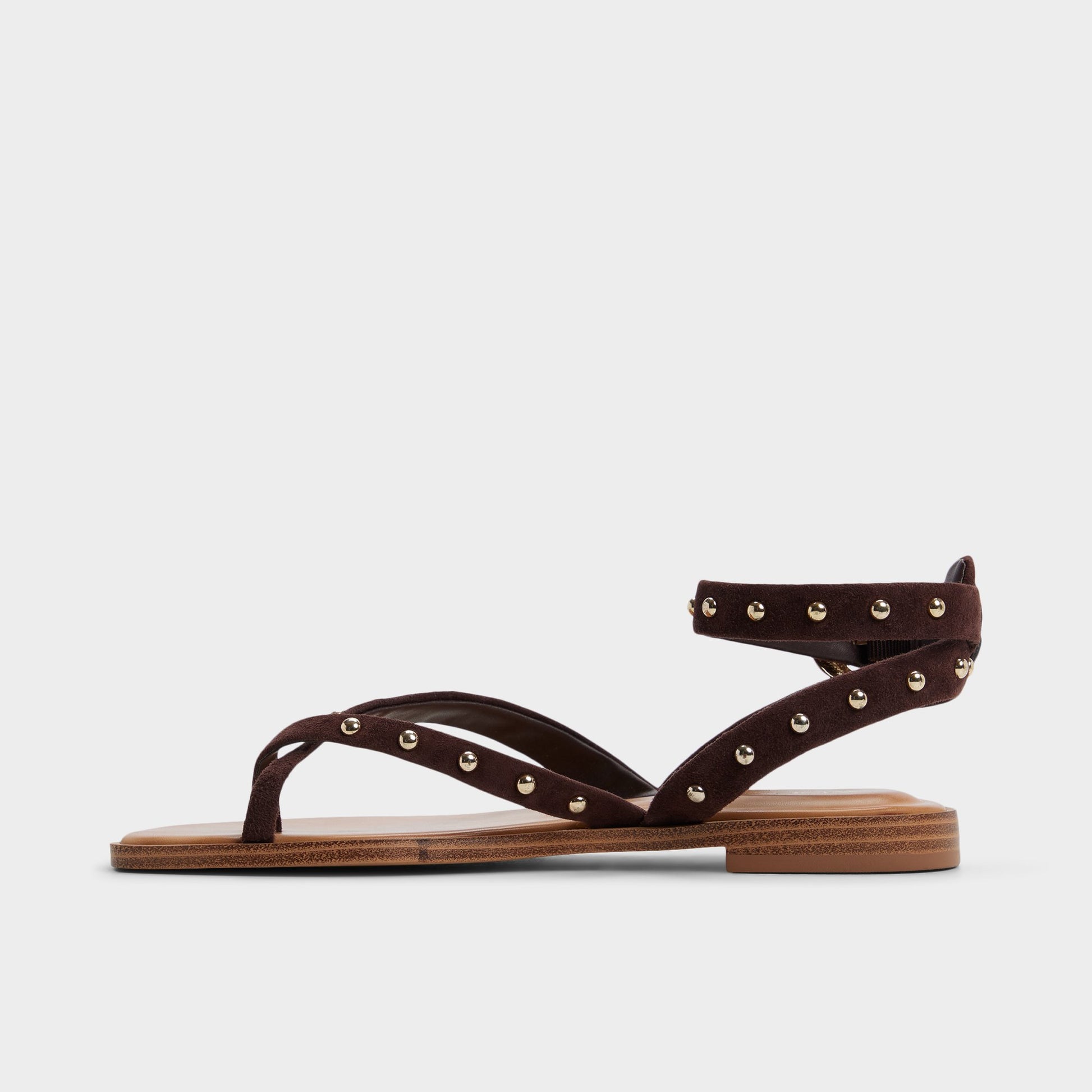 Side view of Dark brown Daressi Flat sandal