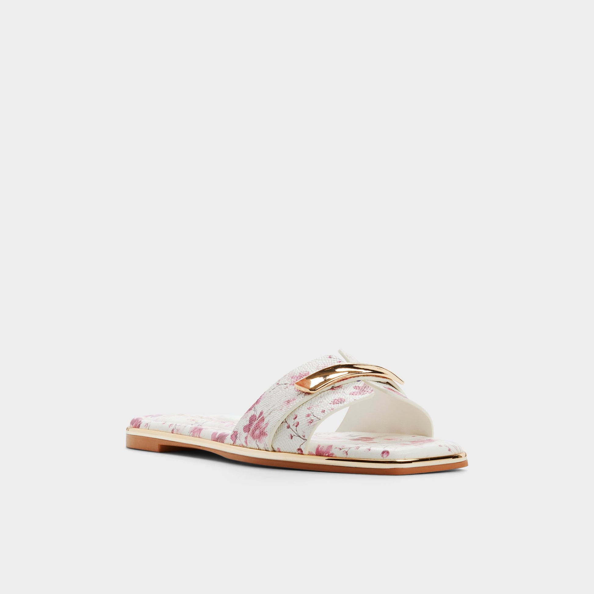 Three-quarter angle of White combo Darlina Slide sandal's front side