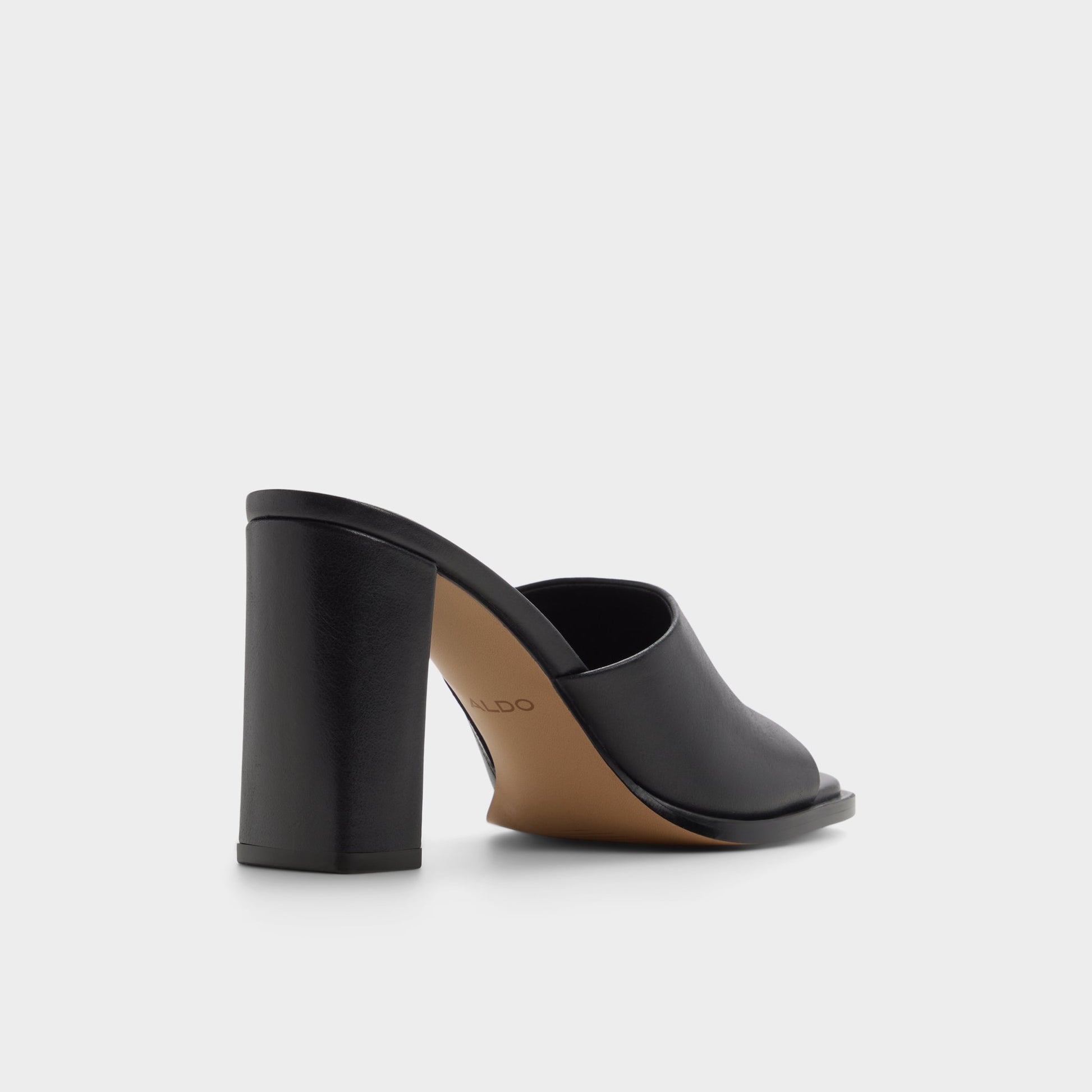 Three-quarter angle of Black Re-sophia Heeled mule's back side