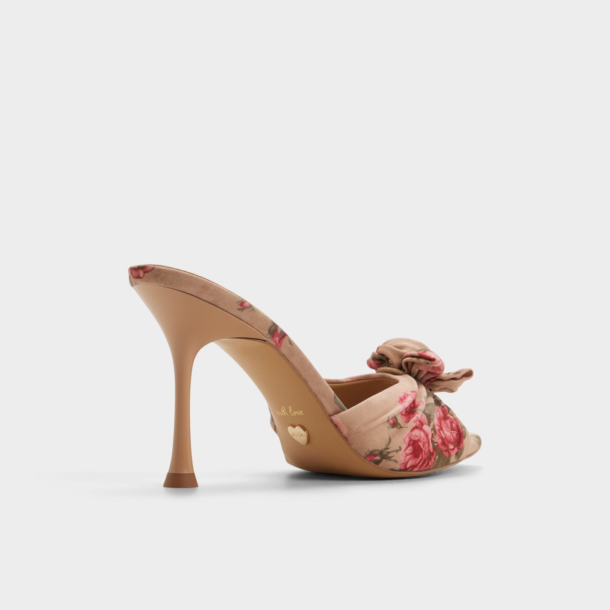 Three-quarter angle of Beige combo Rosalina Heeled mule's back side