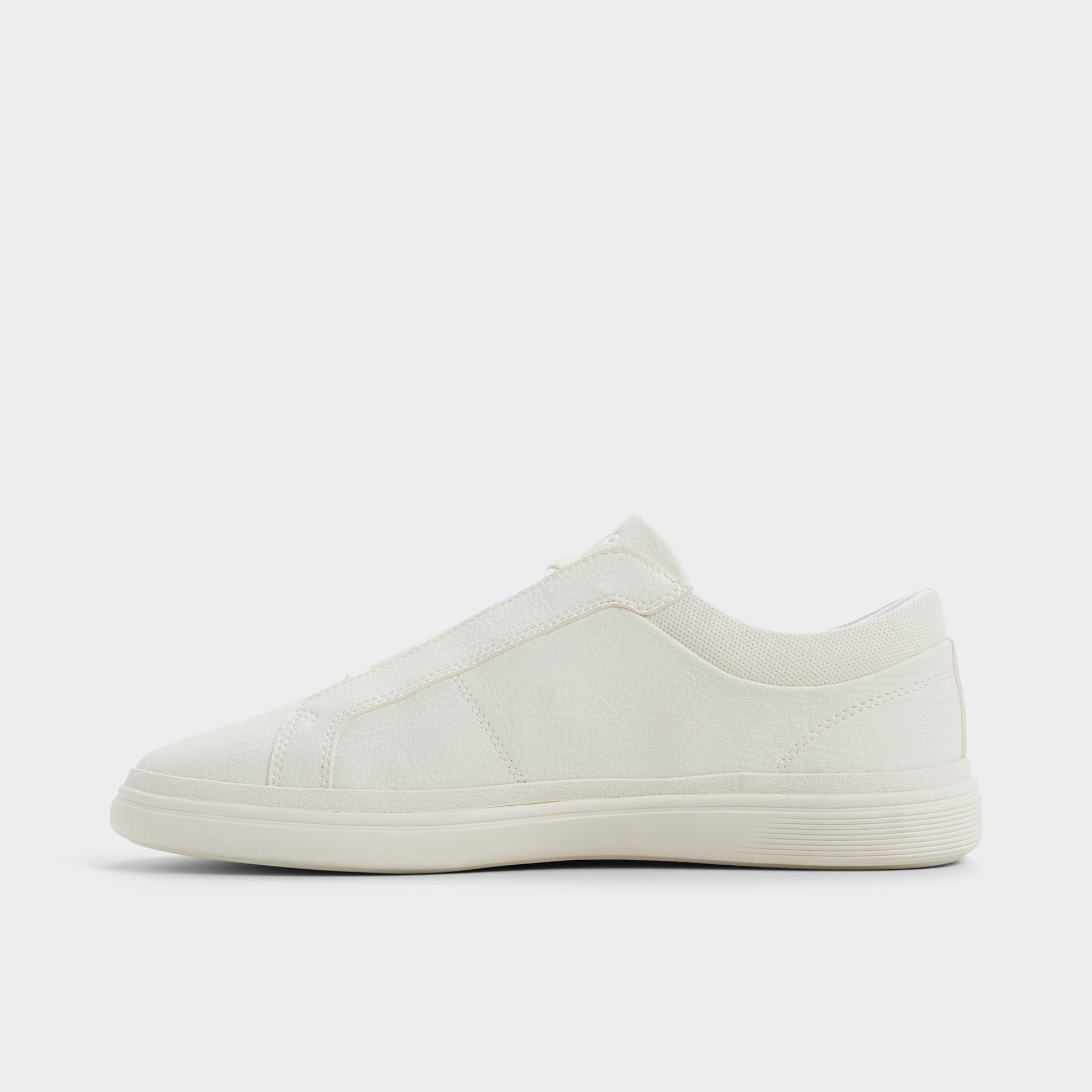 Side view of White Carlson Slip-on sneaker