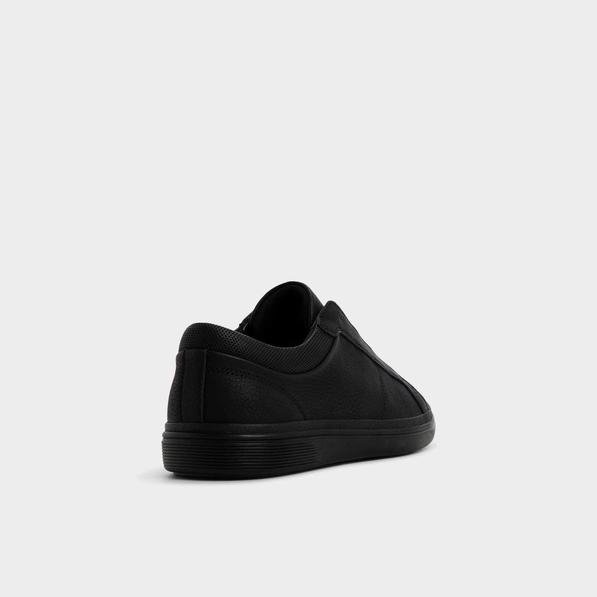 Three-quarter angle of Black Carlson Slip-on sneaker's back side