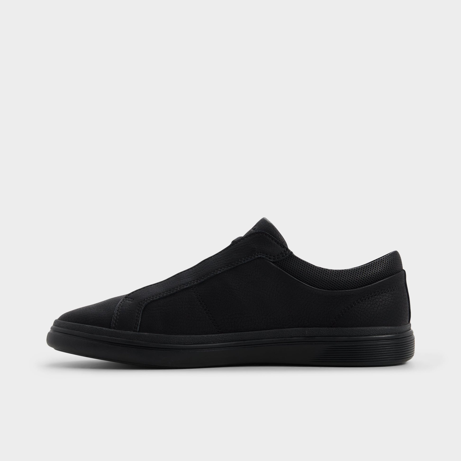 Side view of Black Carlson Slip-on sneaker