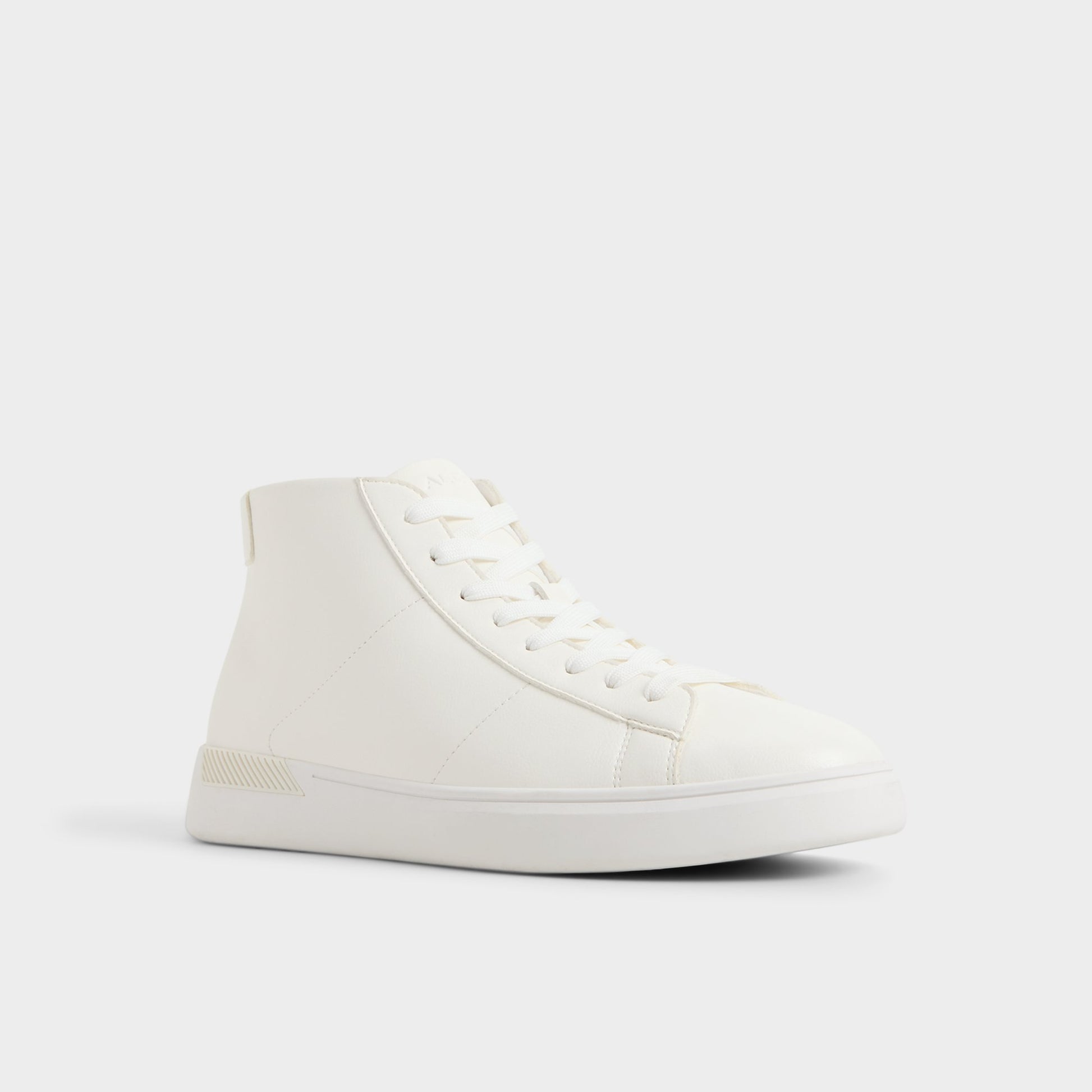 Three-quarter angle of White Toby High top sneaker's front side