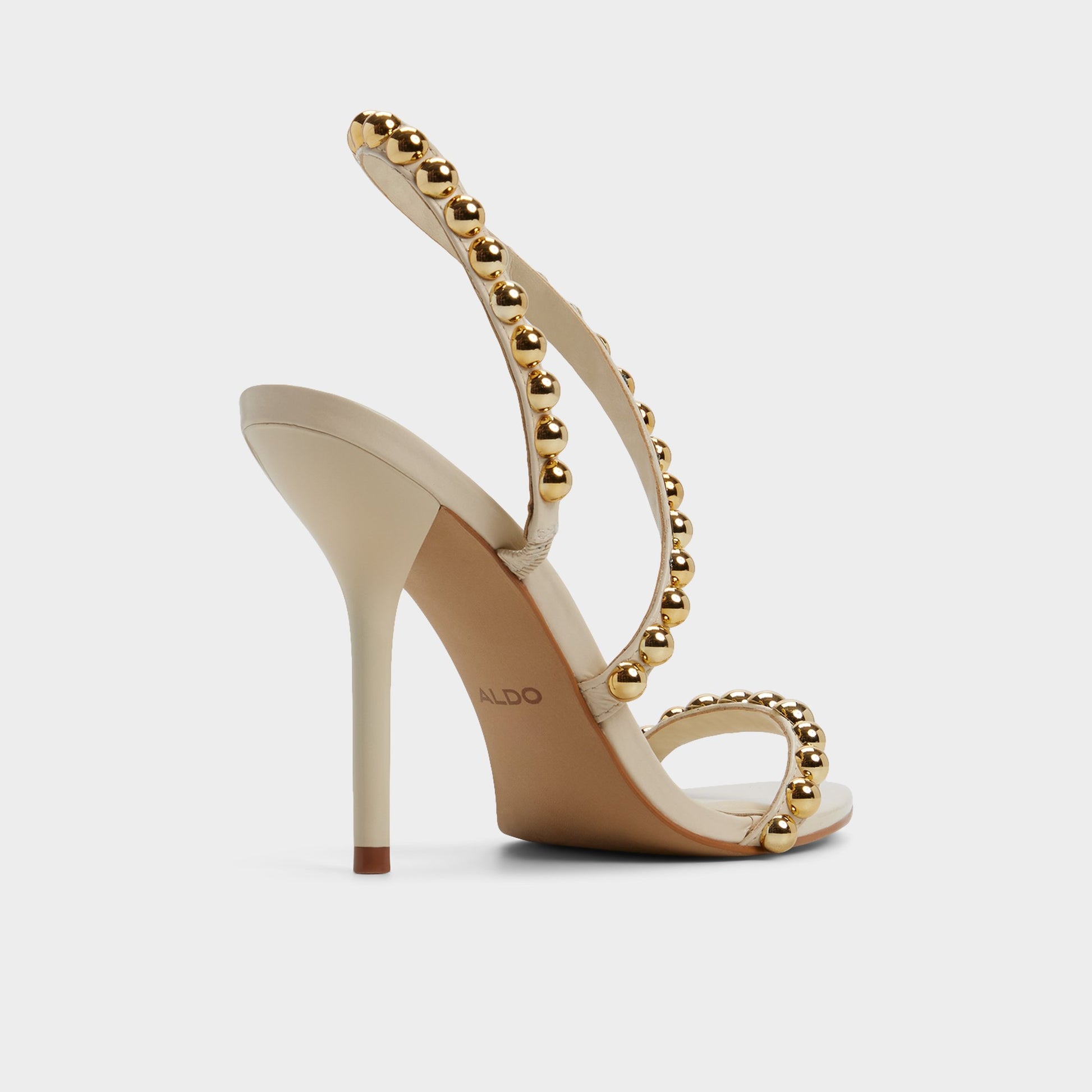 Three-quarter angle of Cream Attey Strappy heeled sandal's back side