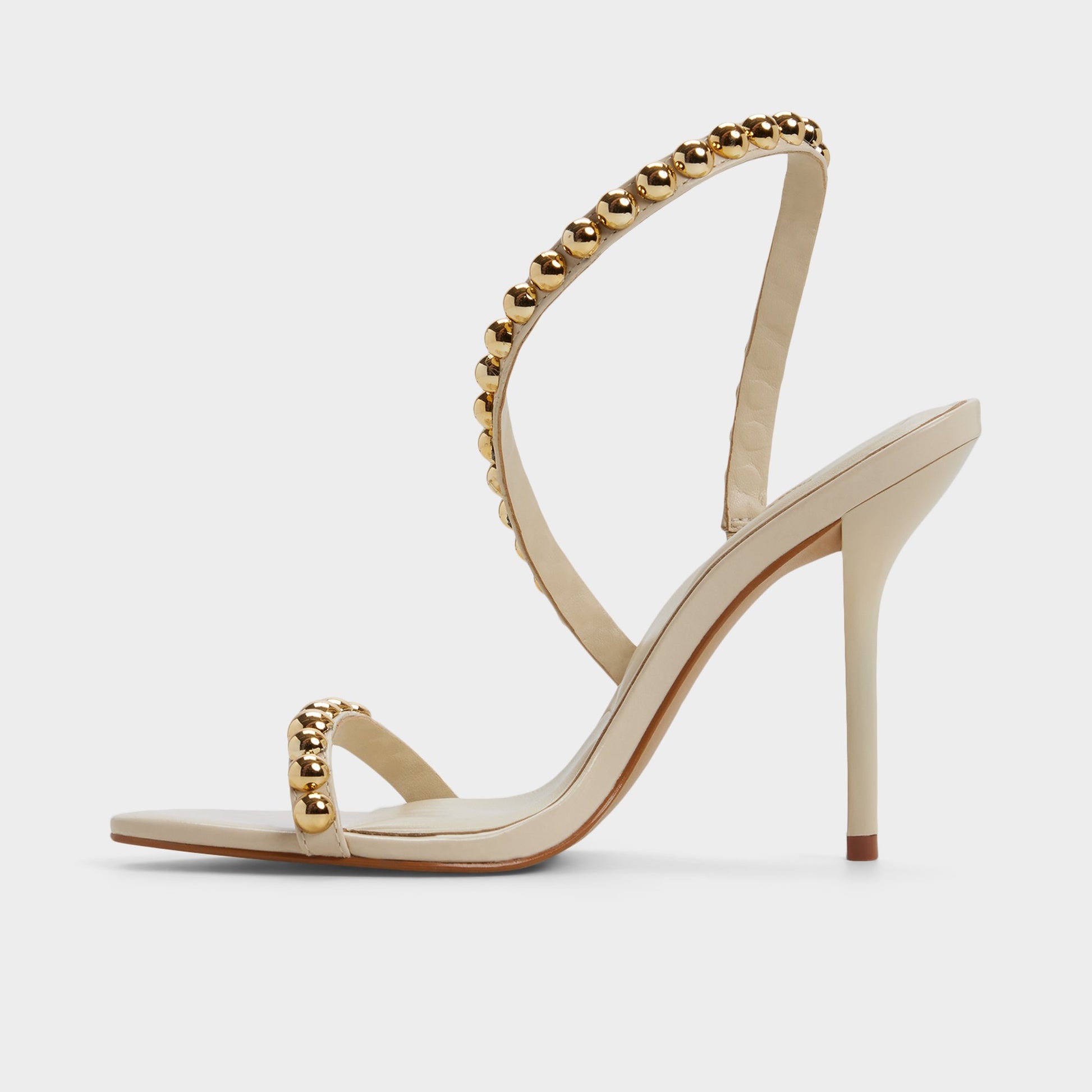 Side view of Cream Attey Strappy heeled sandal