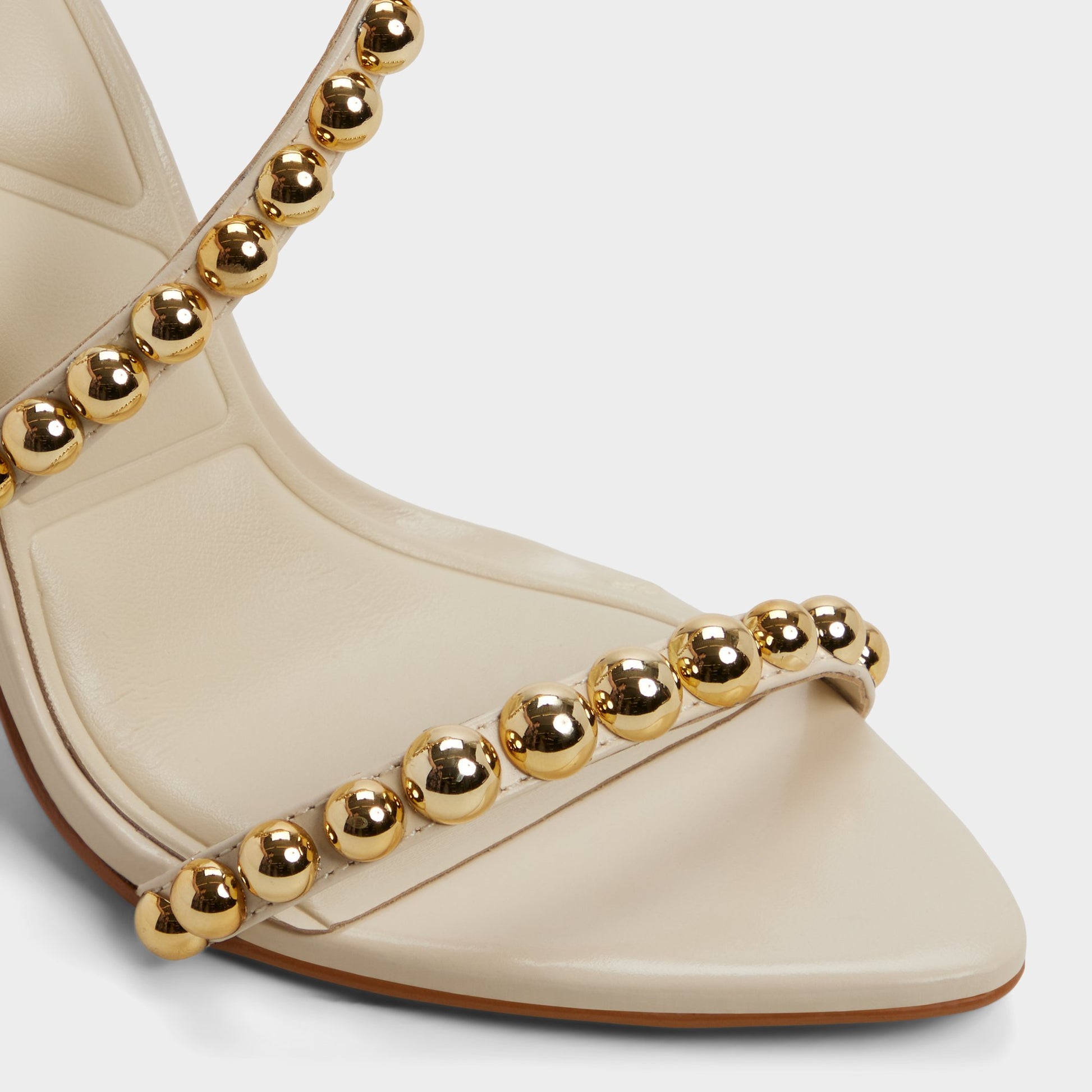 Close-up of the Cream Attey Strappy heeled sandal
