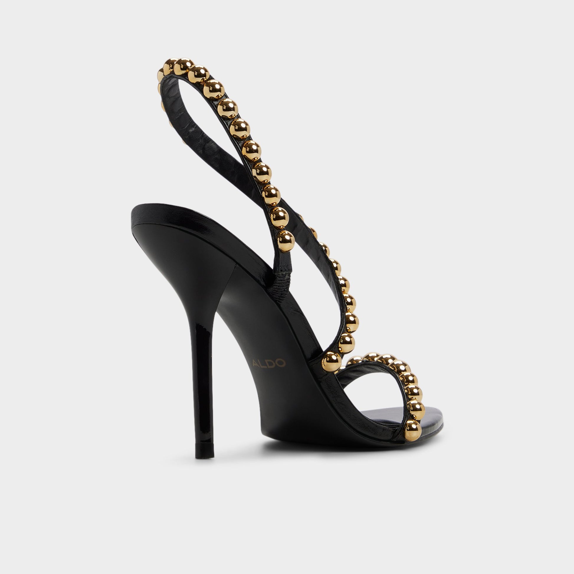 Three-quarter angle of Black Attey Strappy heeled sandal's back side