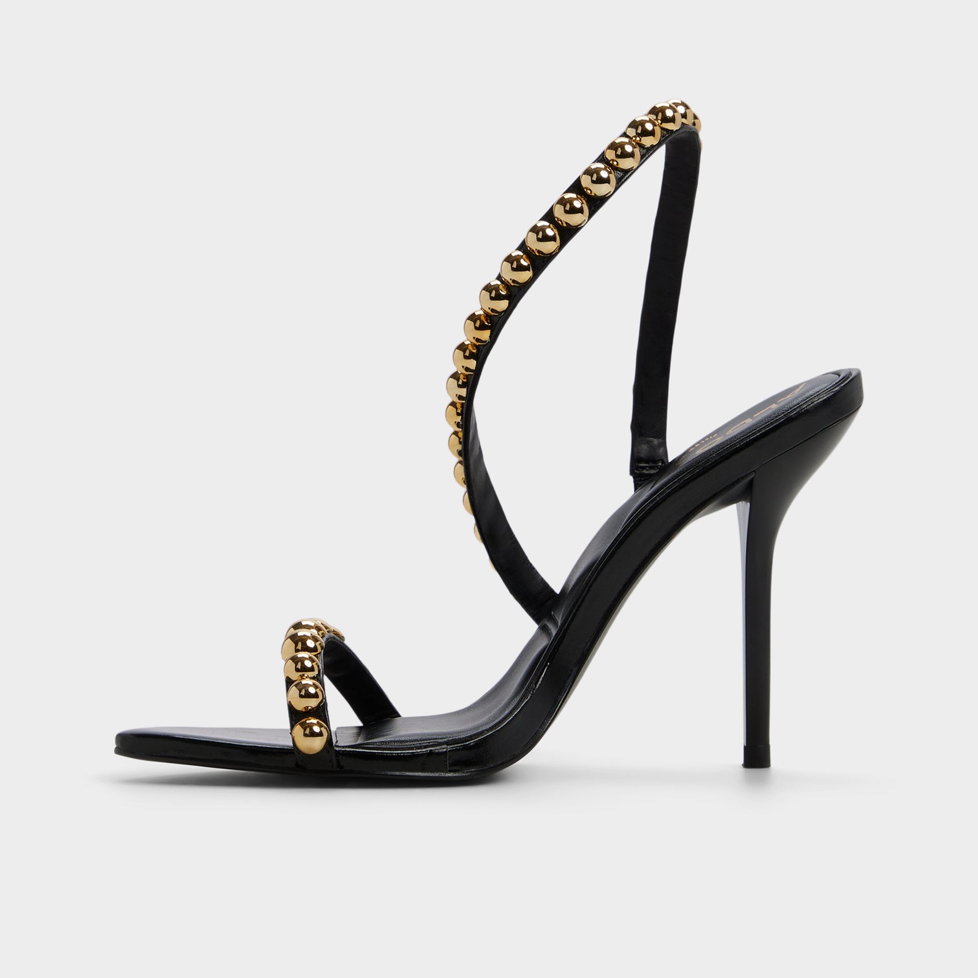 Side view of Black Attey Strappy heeled sandal