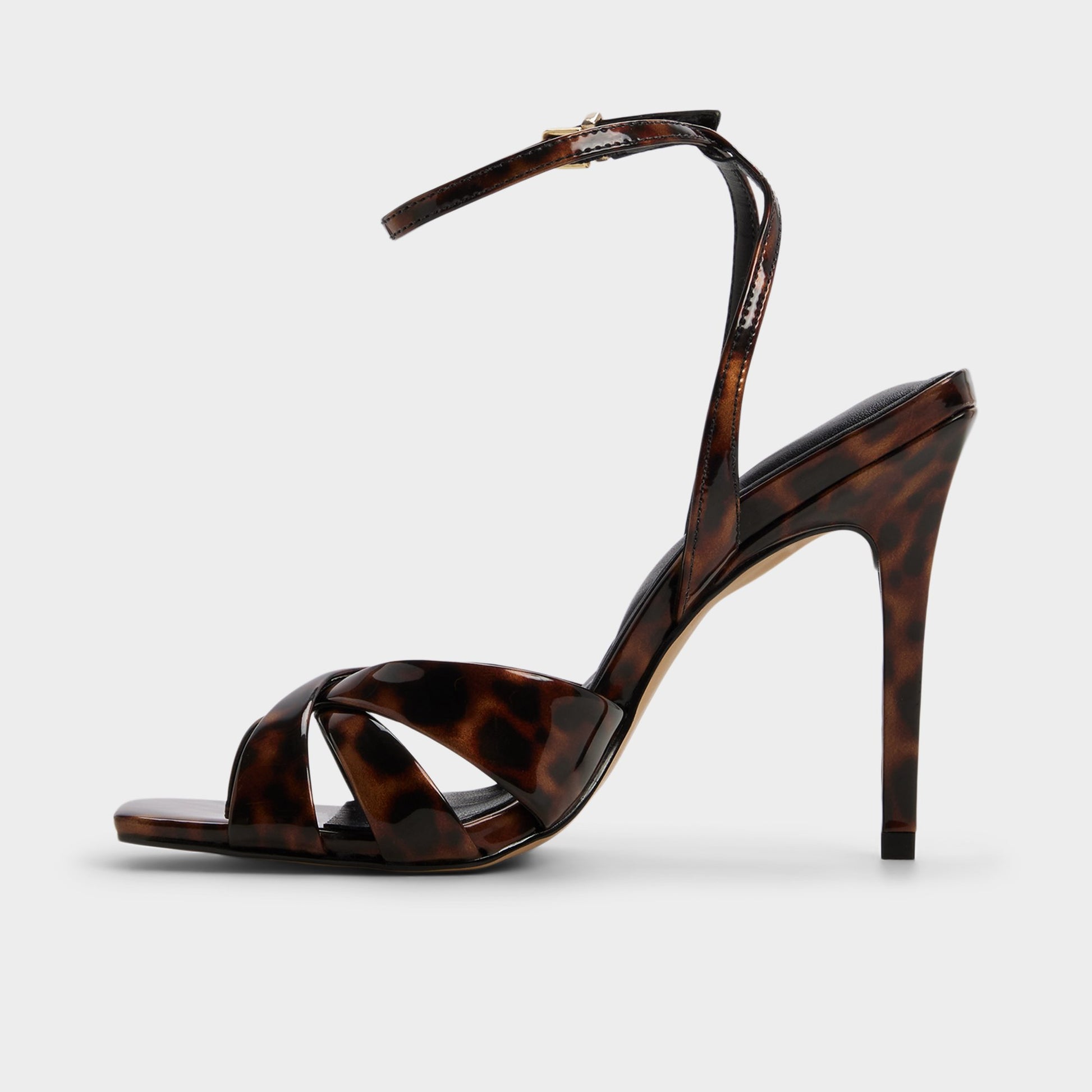 Side view of Open brown Meteora Strappy heeled sandal