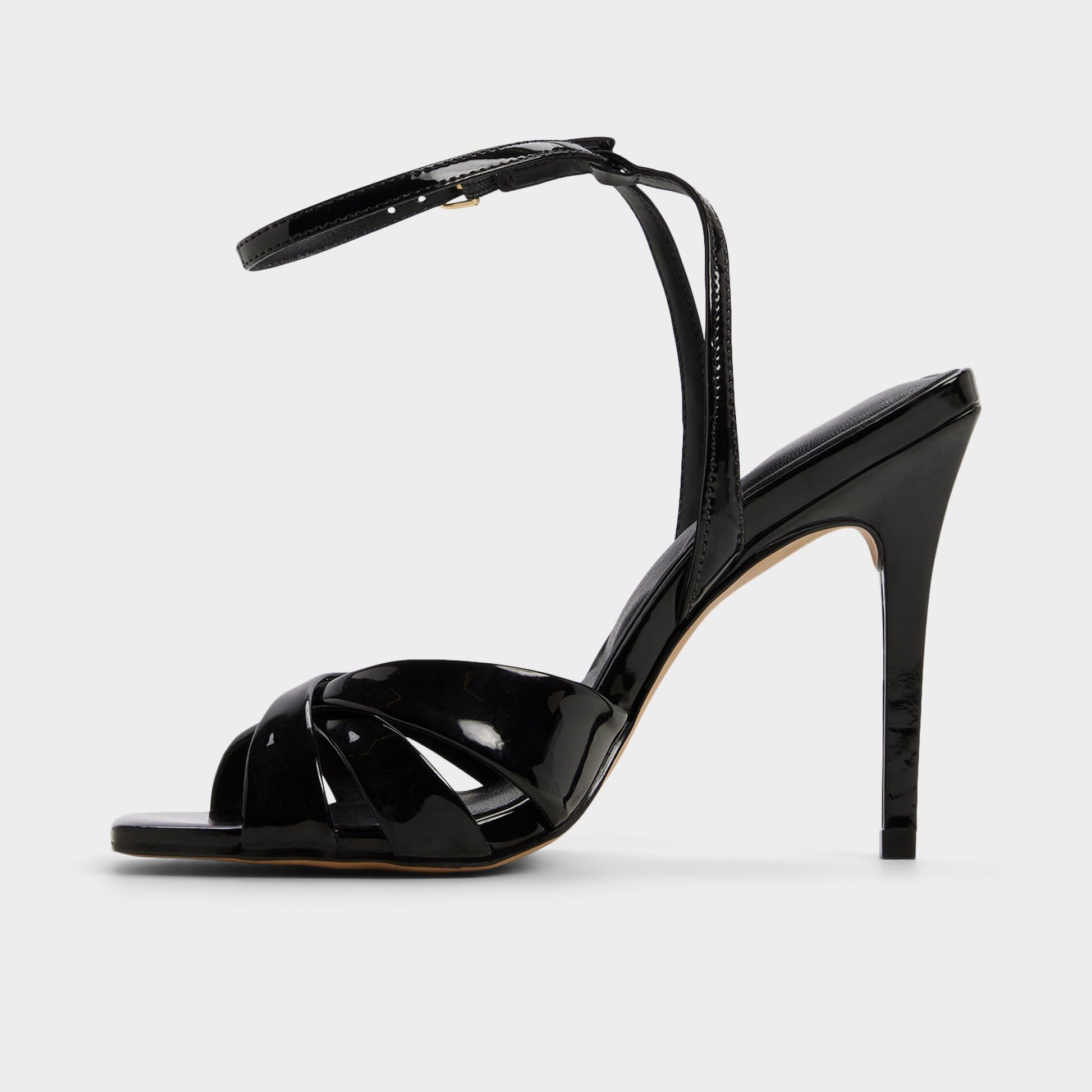 Side view of Black Meteora Strappy heeled sandal