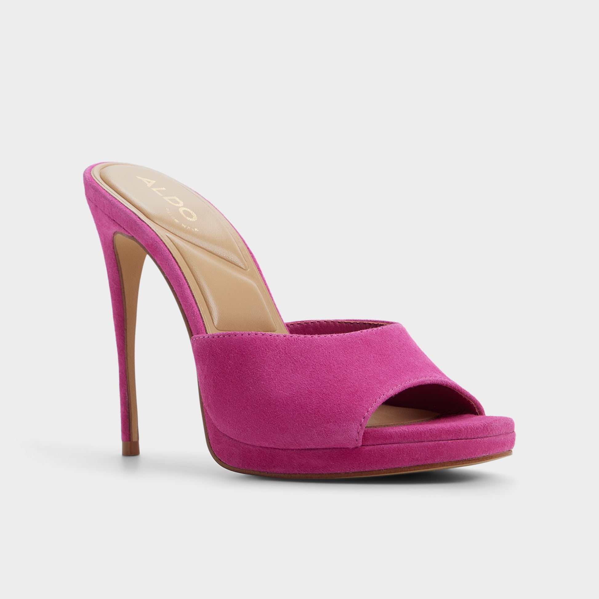 Three-quarter angle of Dark pink Rivieraa Heeled mule's front side