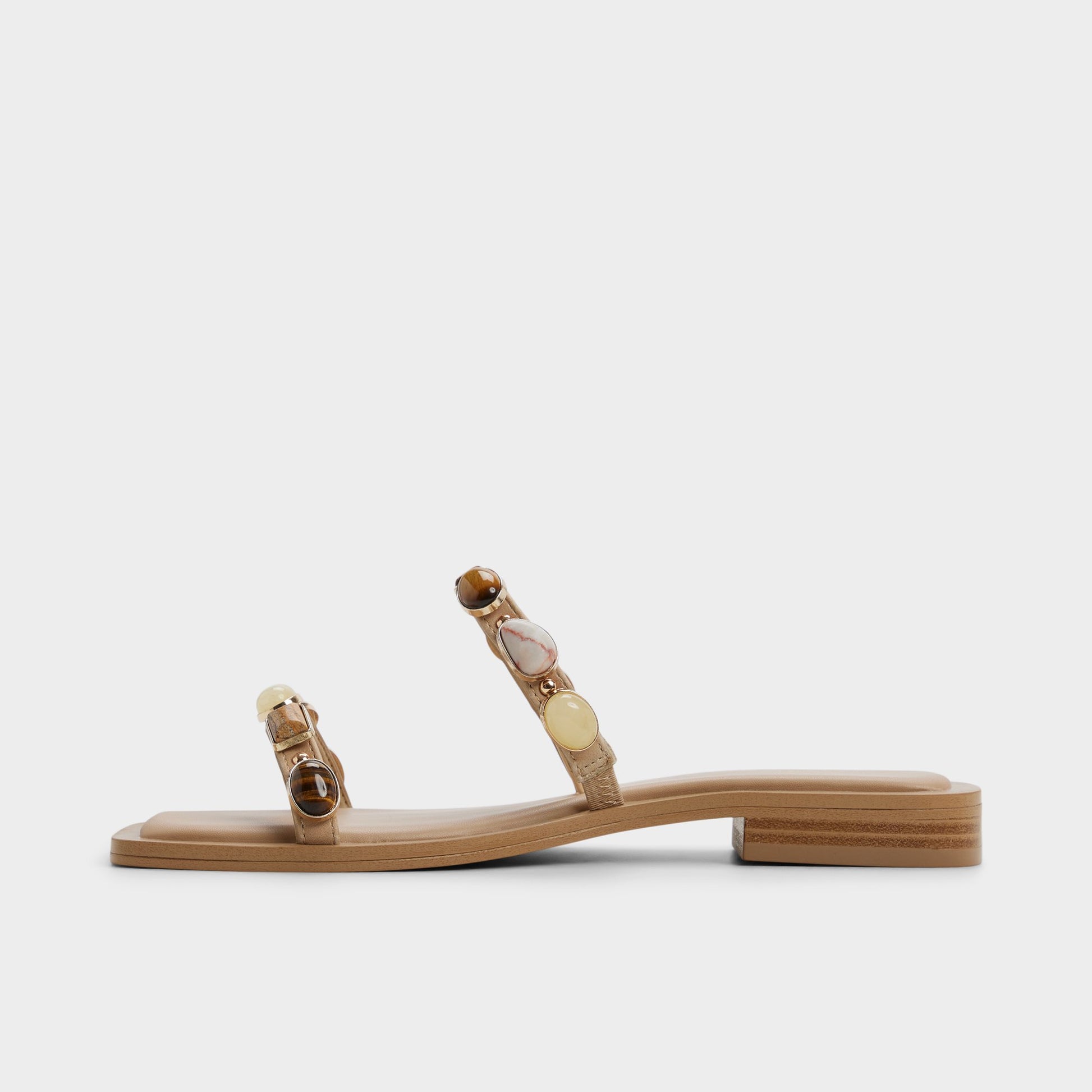 Side view of Medium beige Sapphira Slide sandal
