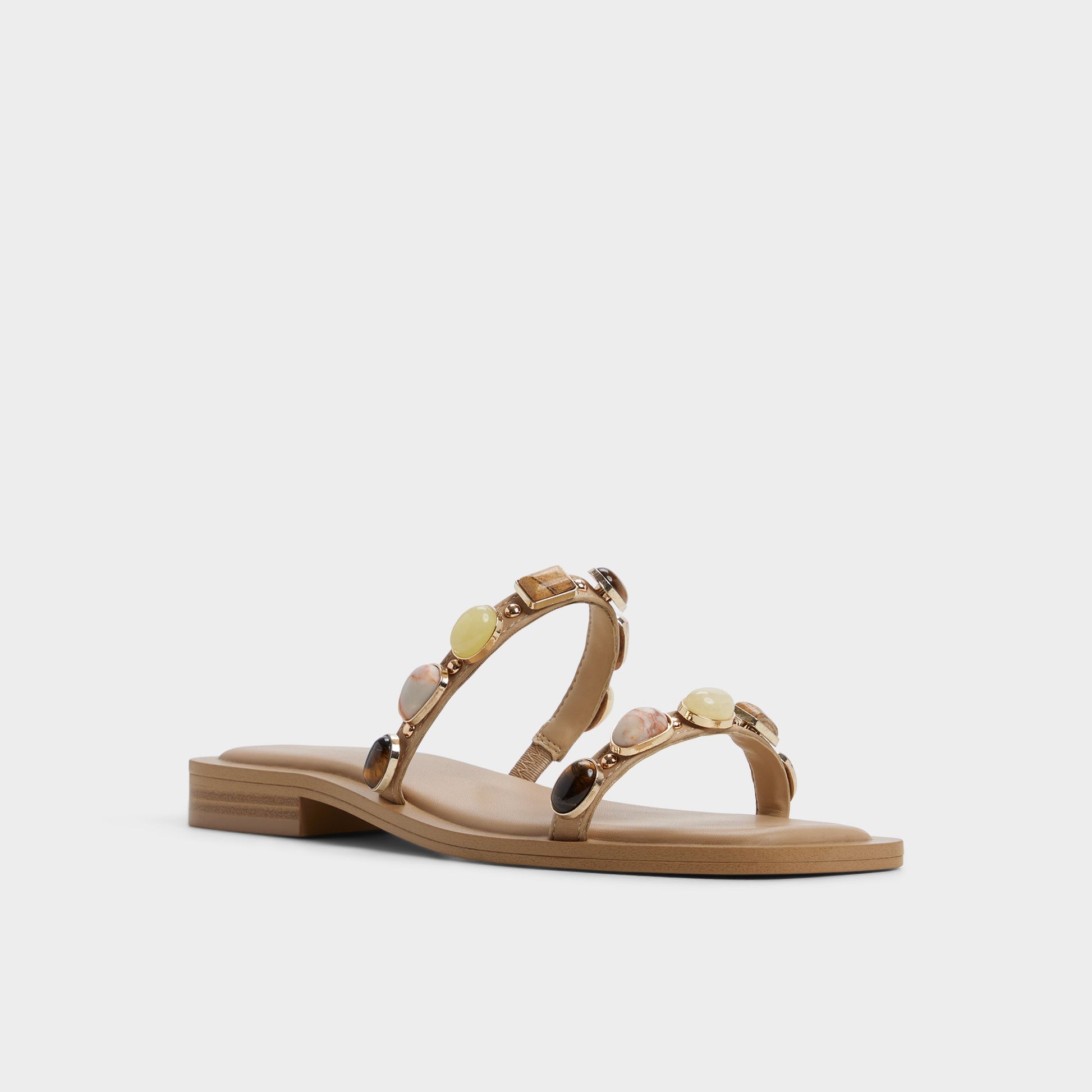 Three-quarter angle of Medium beige Sapphira Slide sandal's front side
