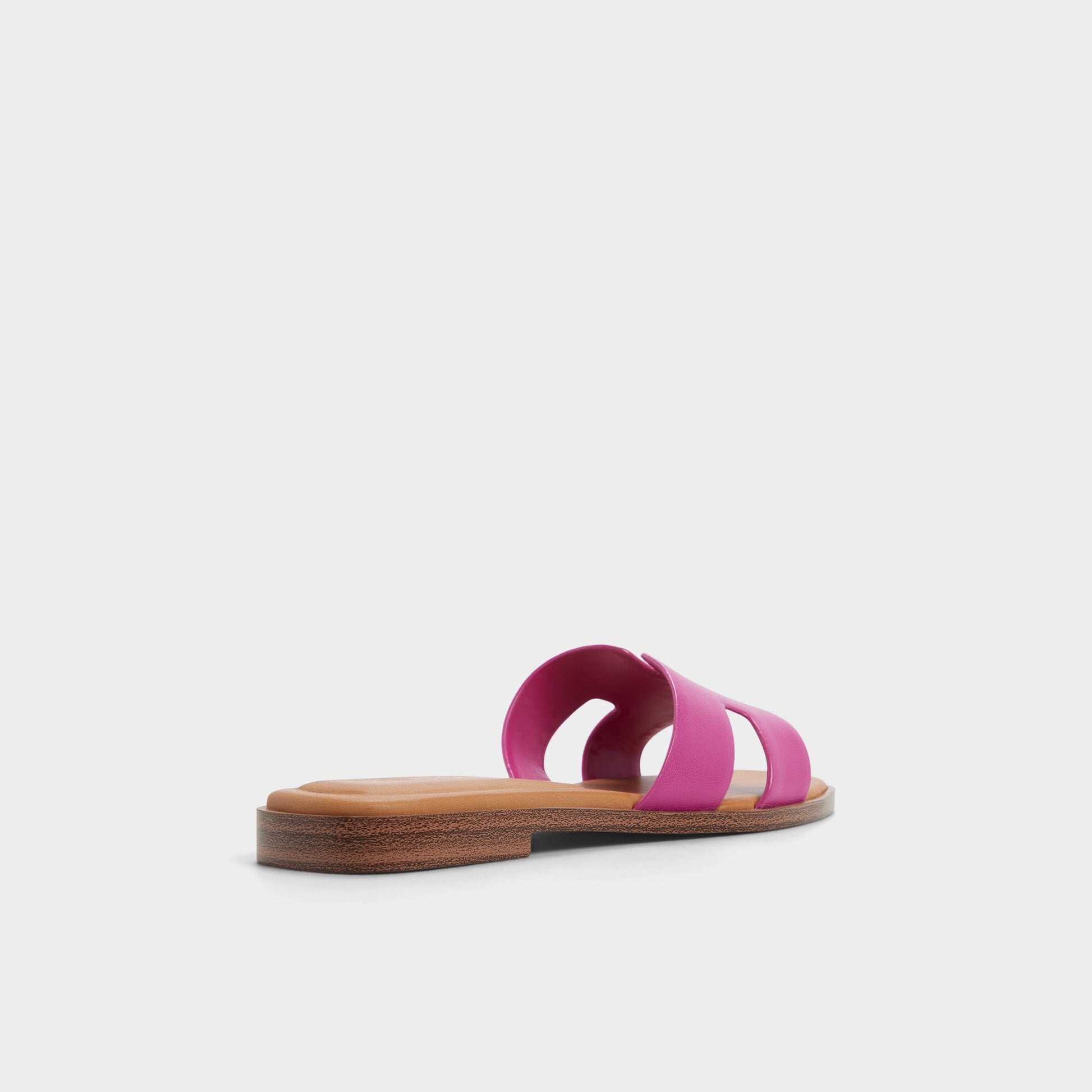 Three-quarter angle of Dark pink Itsandal Slide sandal's back side