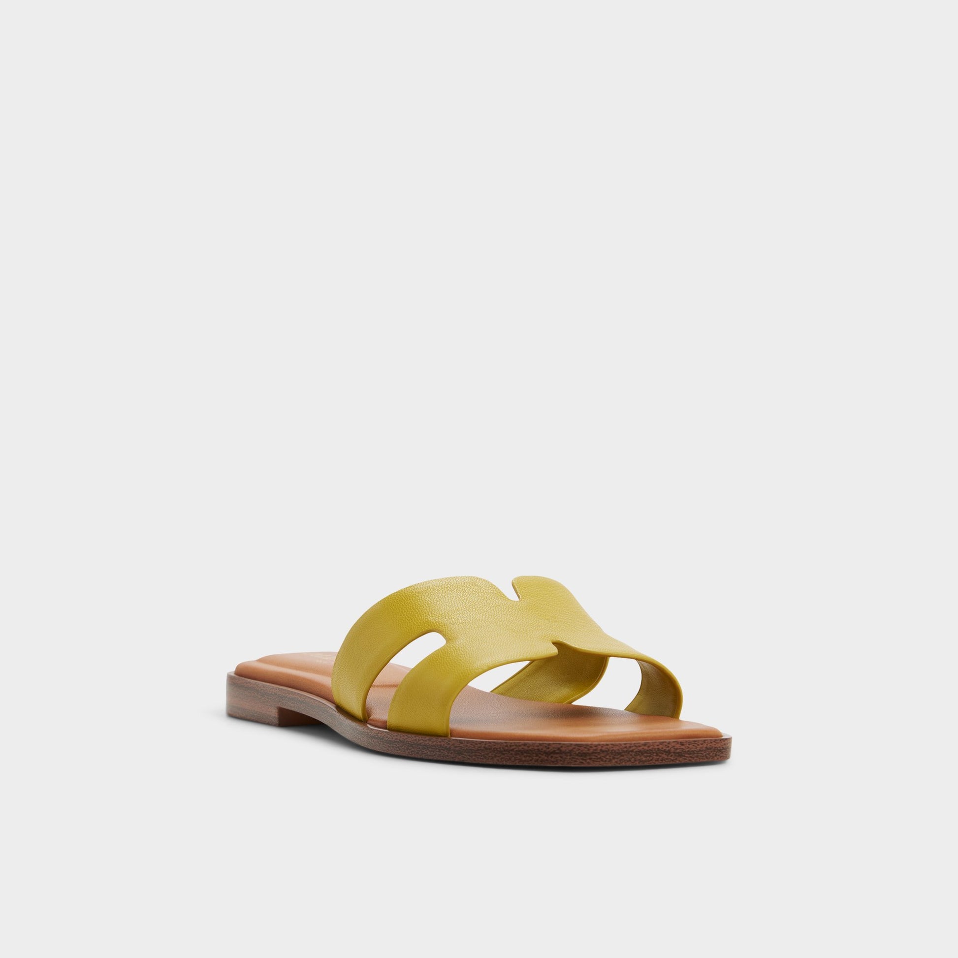 Three-quarter angle of Other yellow Itsandal Slide sandal's front side