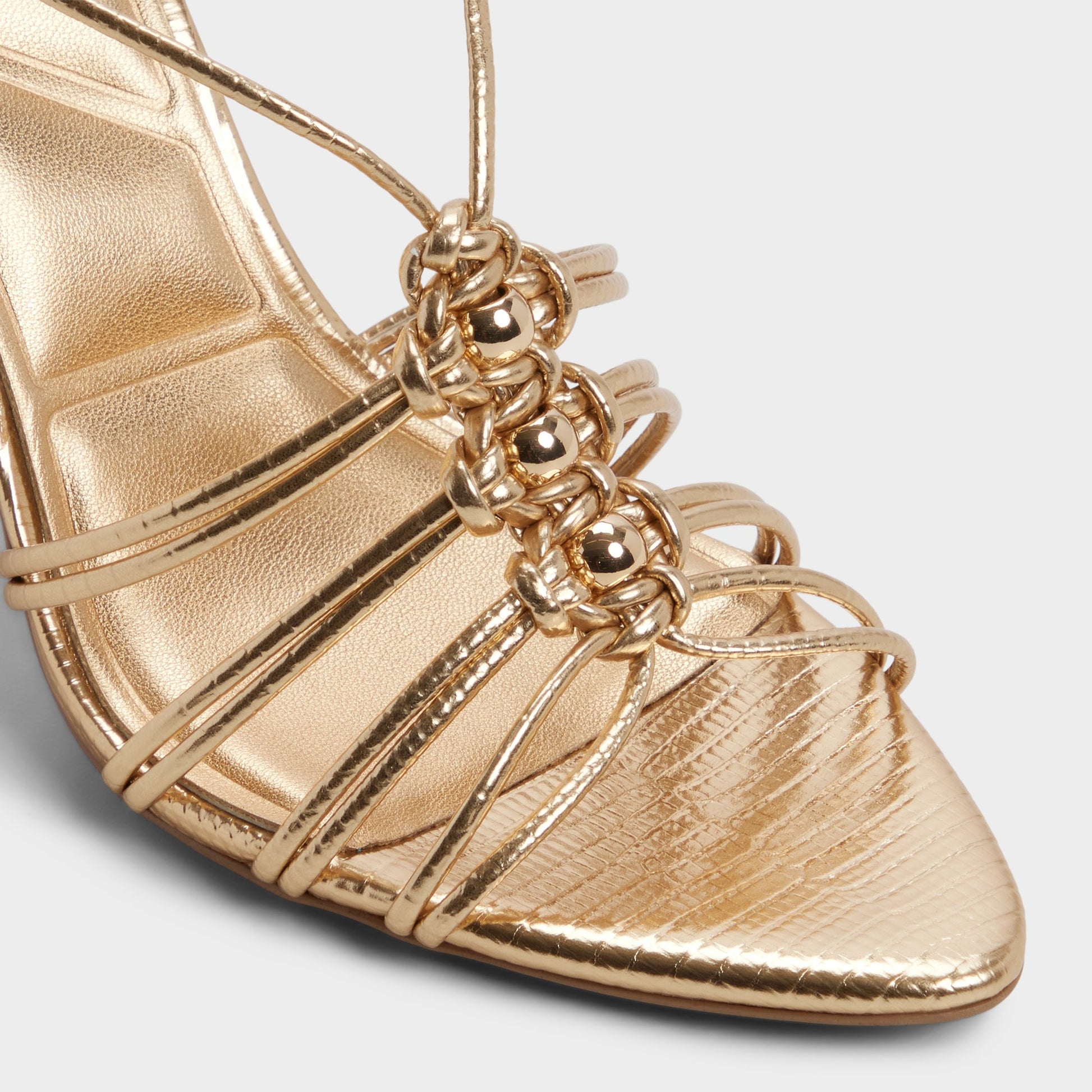 Close-up of the Gold Curacao Strappy heeled sandal