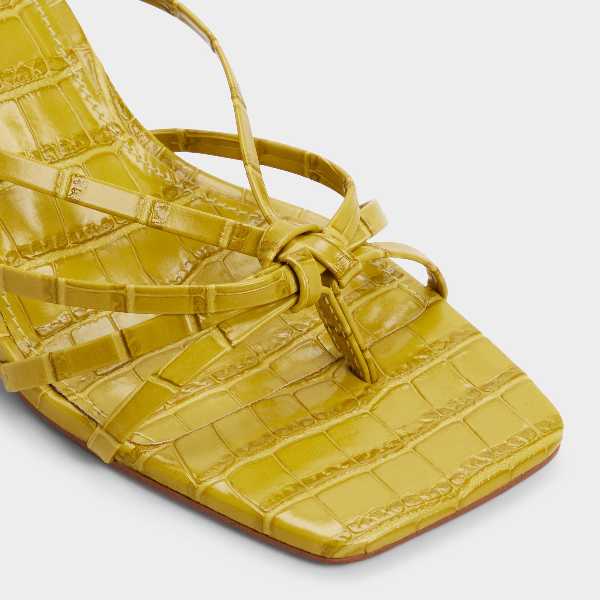 Close-up of the Other yellow Lumera Heeled mule