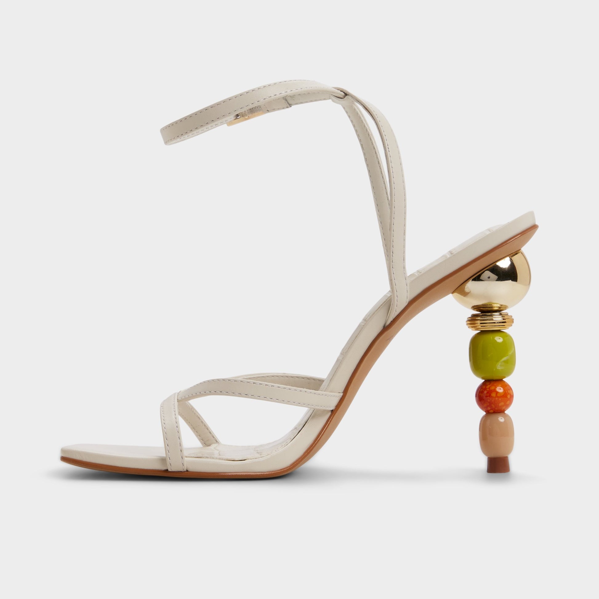 Side view of White/bone Beachglass Strappy heeled sandal