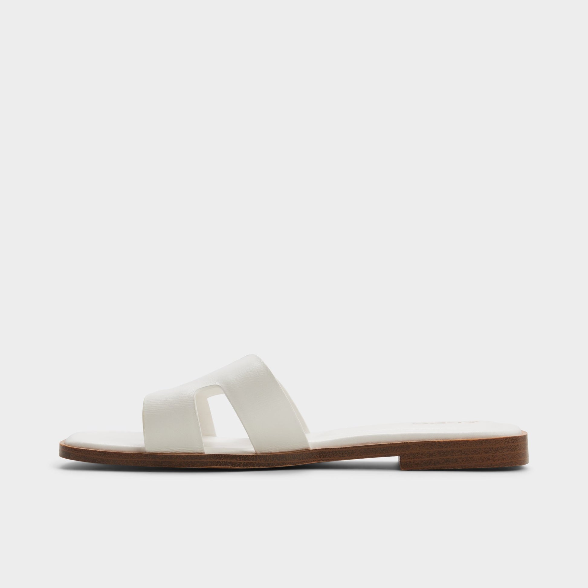 Side view of White Itsandalb Slide sandal