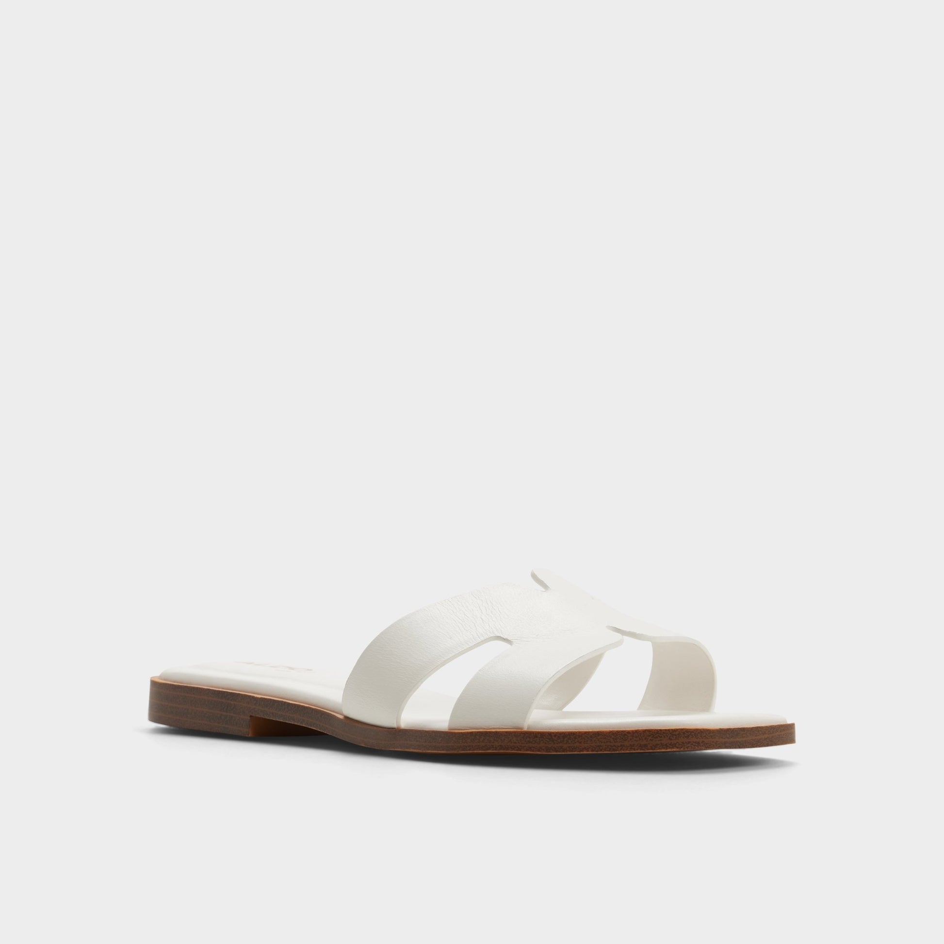 Three-quarter angle of White Itsandalb Slide sandal's front side