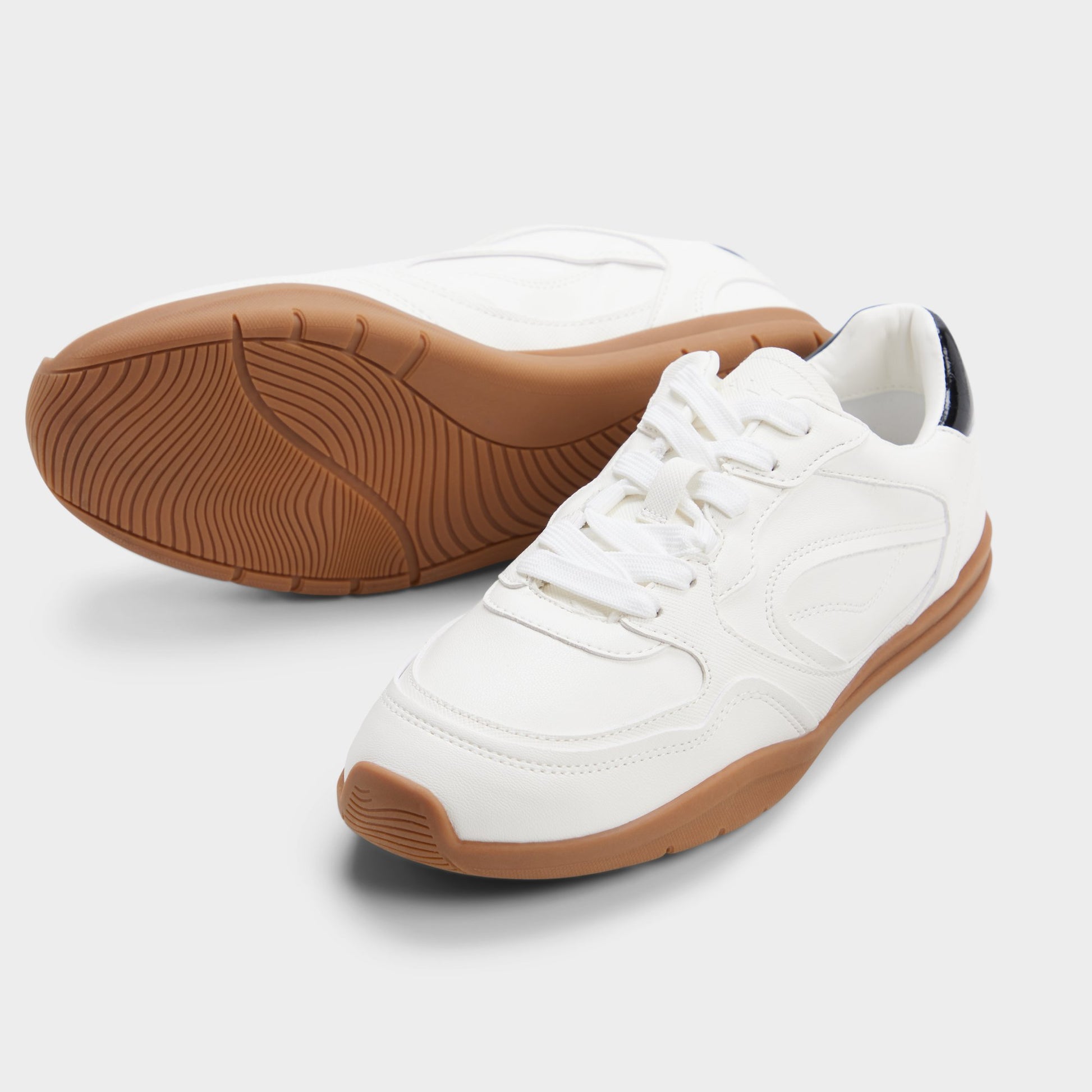 Highlighted view of a pair of White Jendaya s