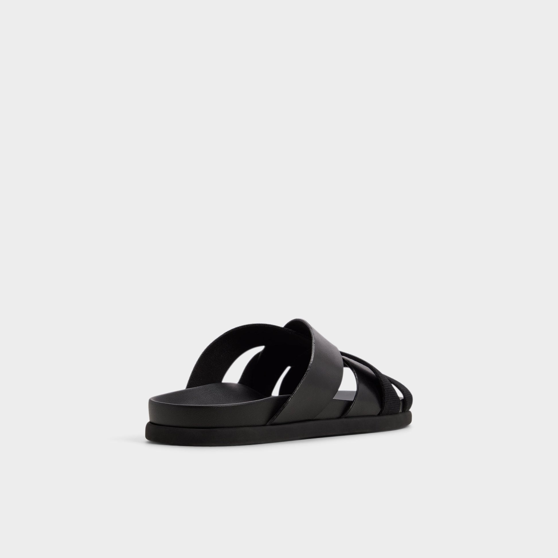 Three-quarter angle of Black Florian Slide sandal's back side