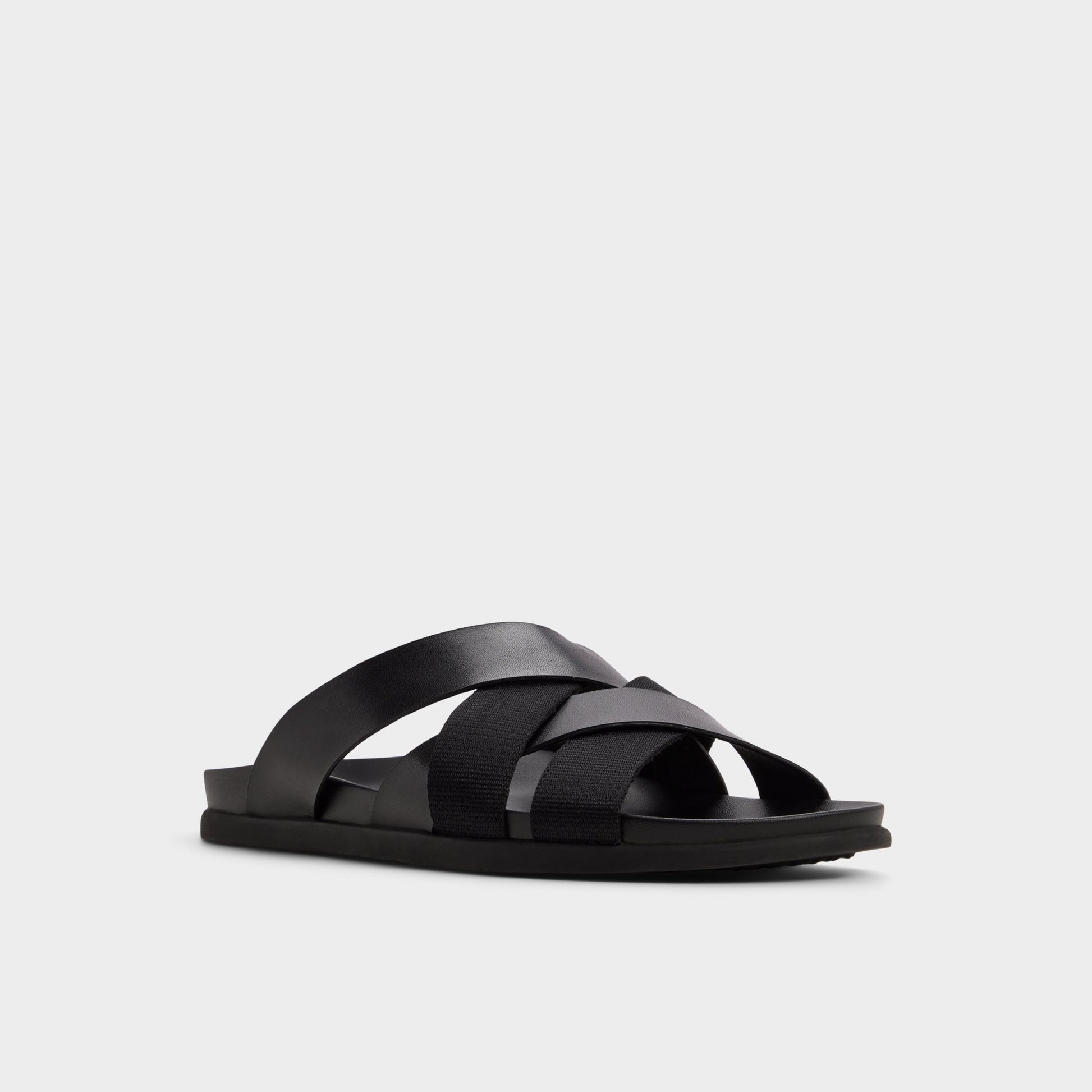 Three-quarter angle of Black Florian Slide sandal's front side