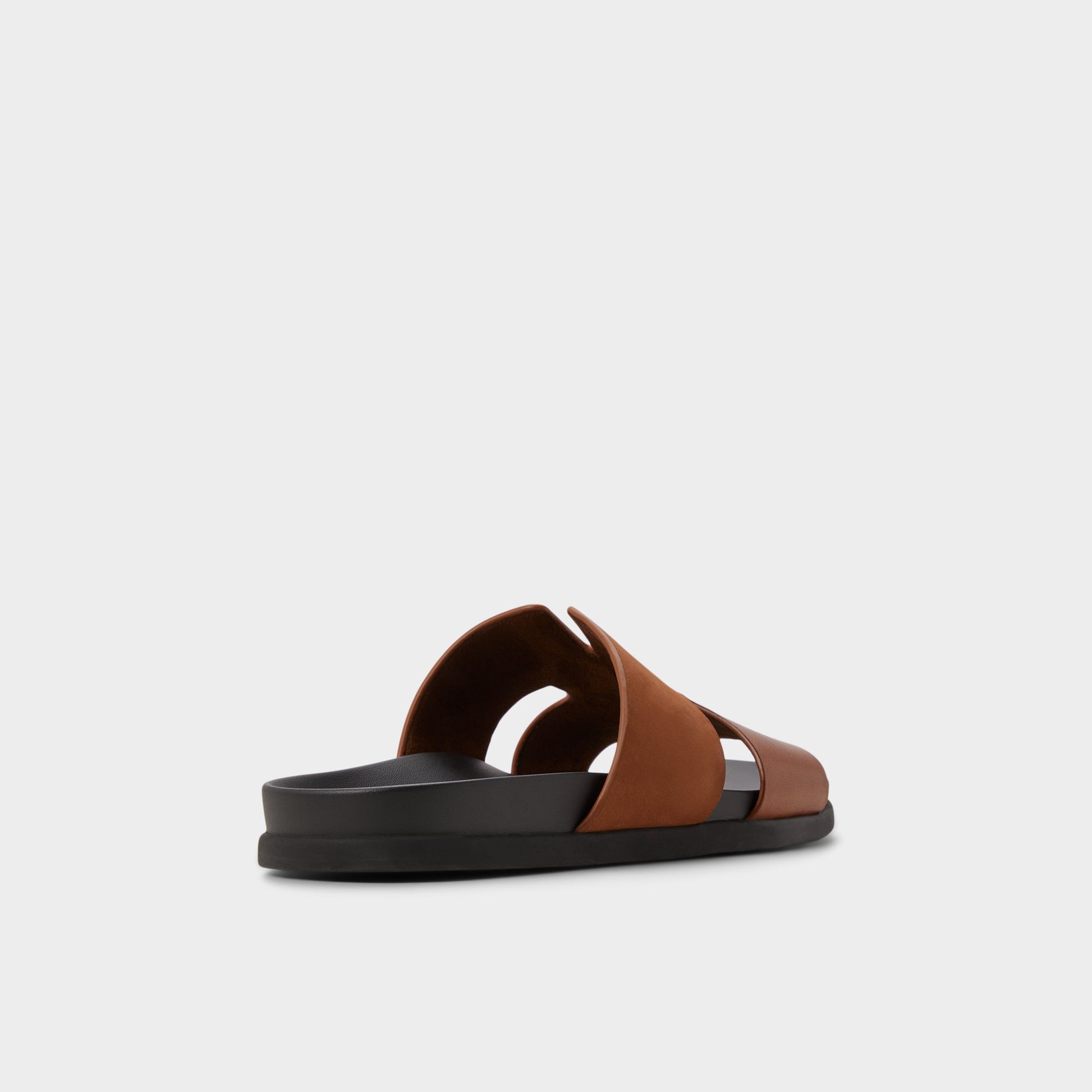 Three-quarter angle of Cognac Marcelo Slide sandal's back side