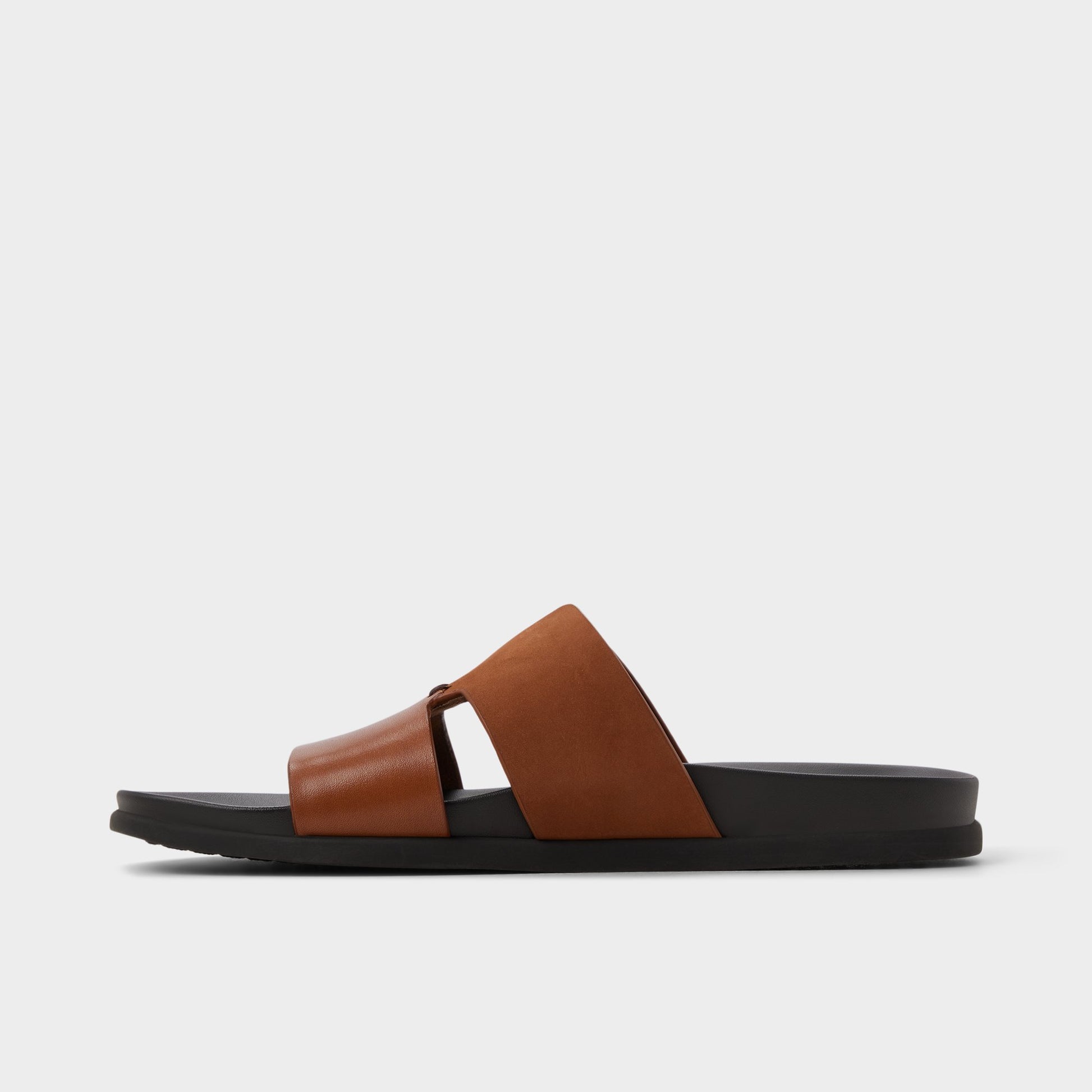 Side view of Cognac Marcelo Slide sandal