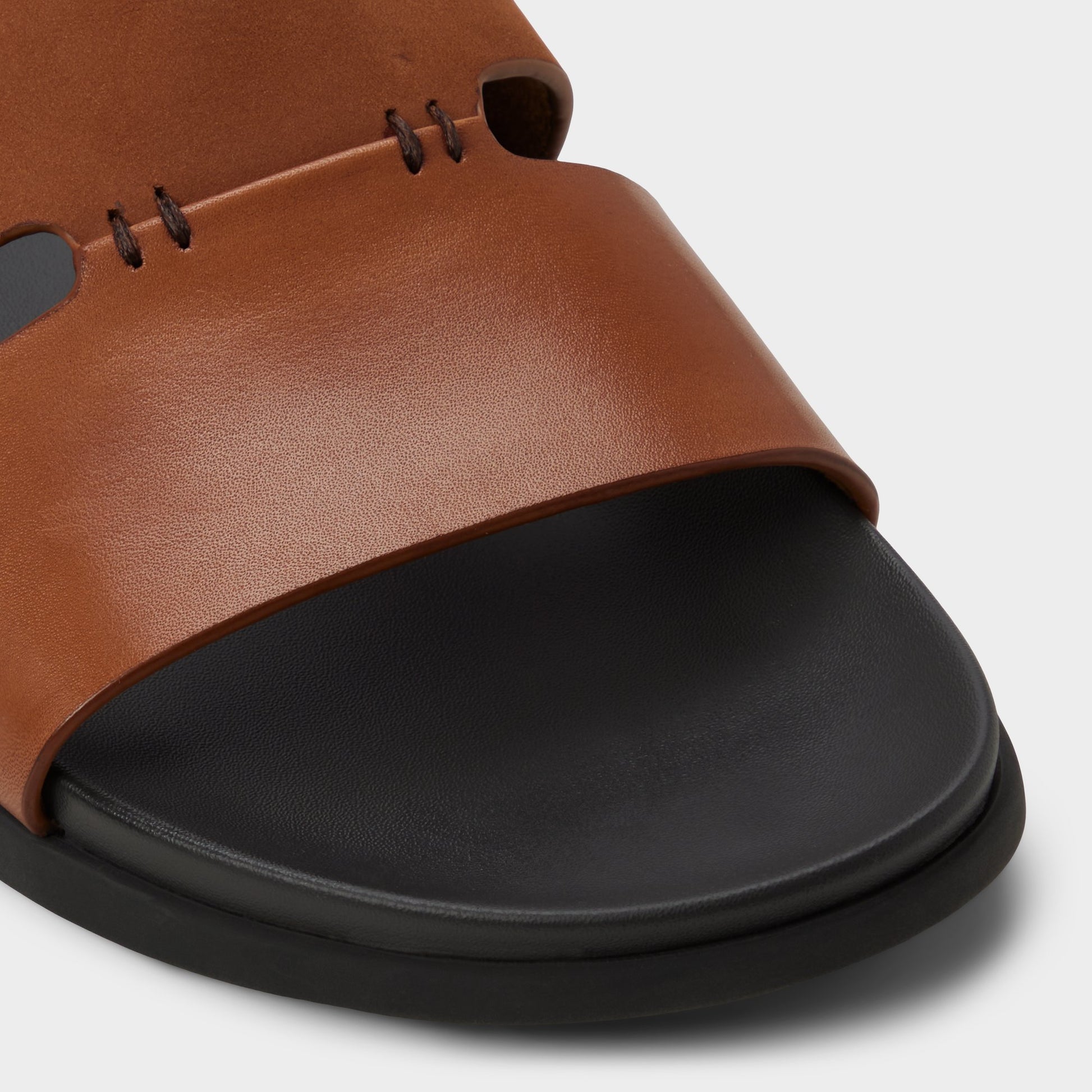 Close-up of the Cognac Marcelo Slide sandal