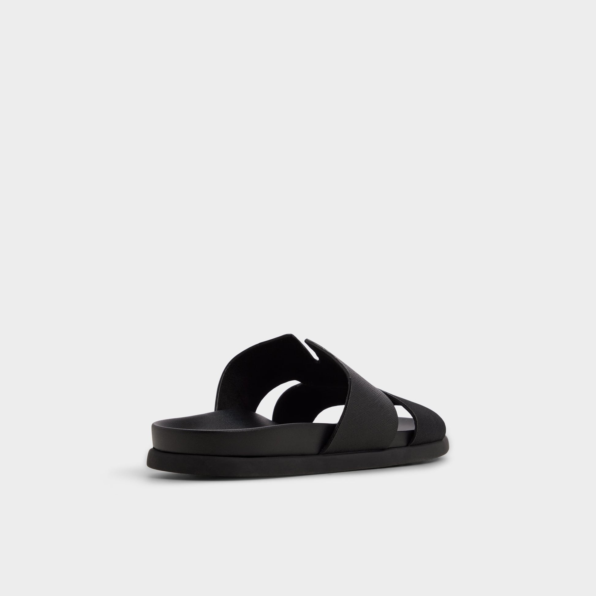 Three-quarter angle of Black Marcelo Slide sandal's back side