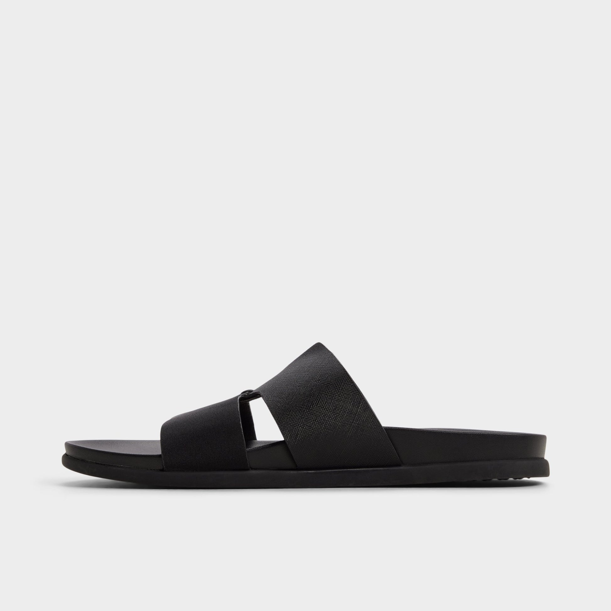 Side view of Black Marcelo Slide sandal