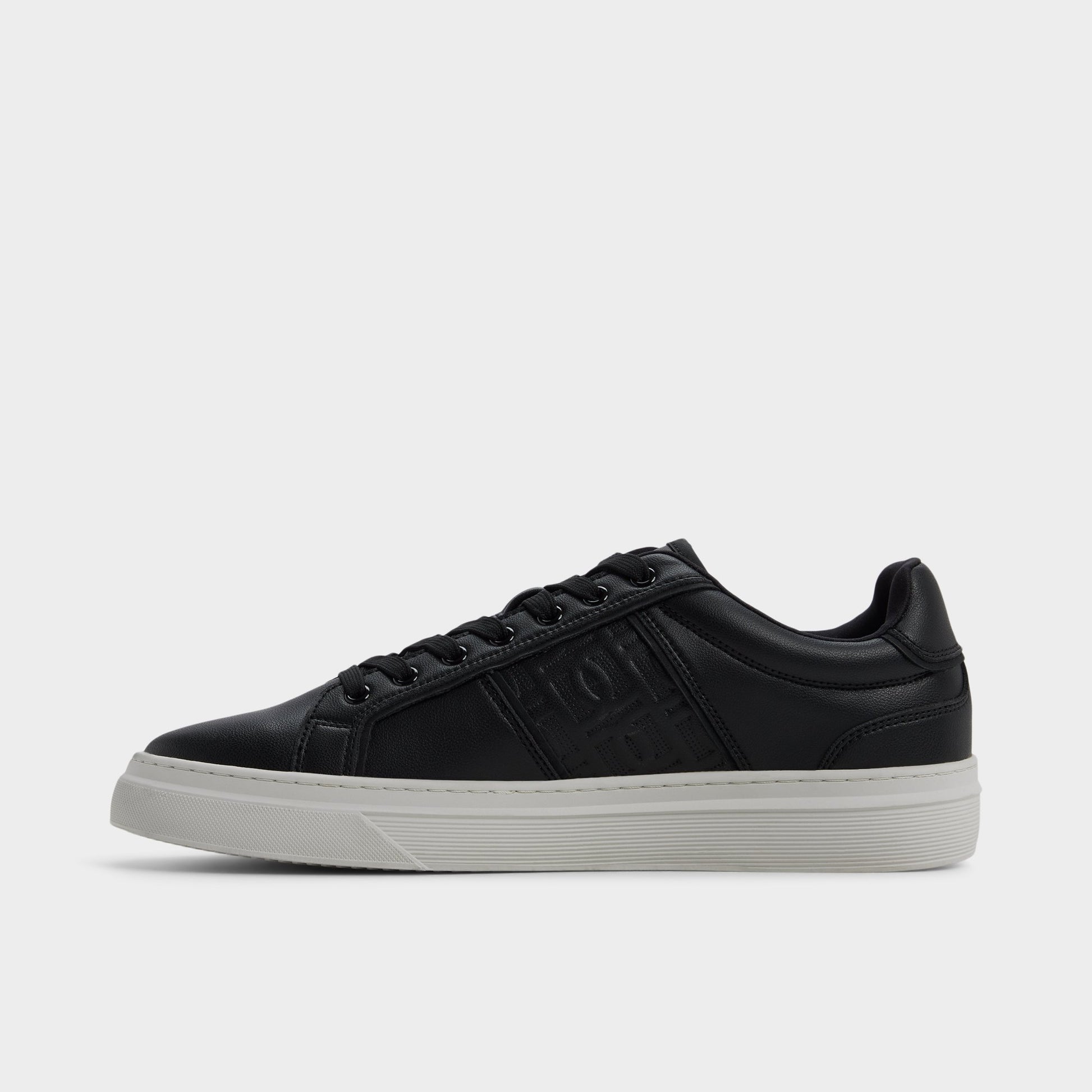 Side view of Black/black Courtline Low top sneaker