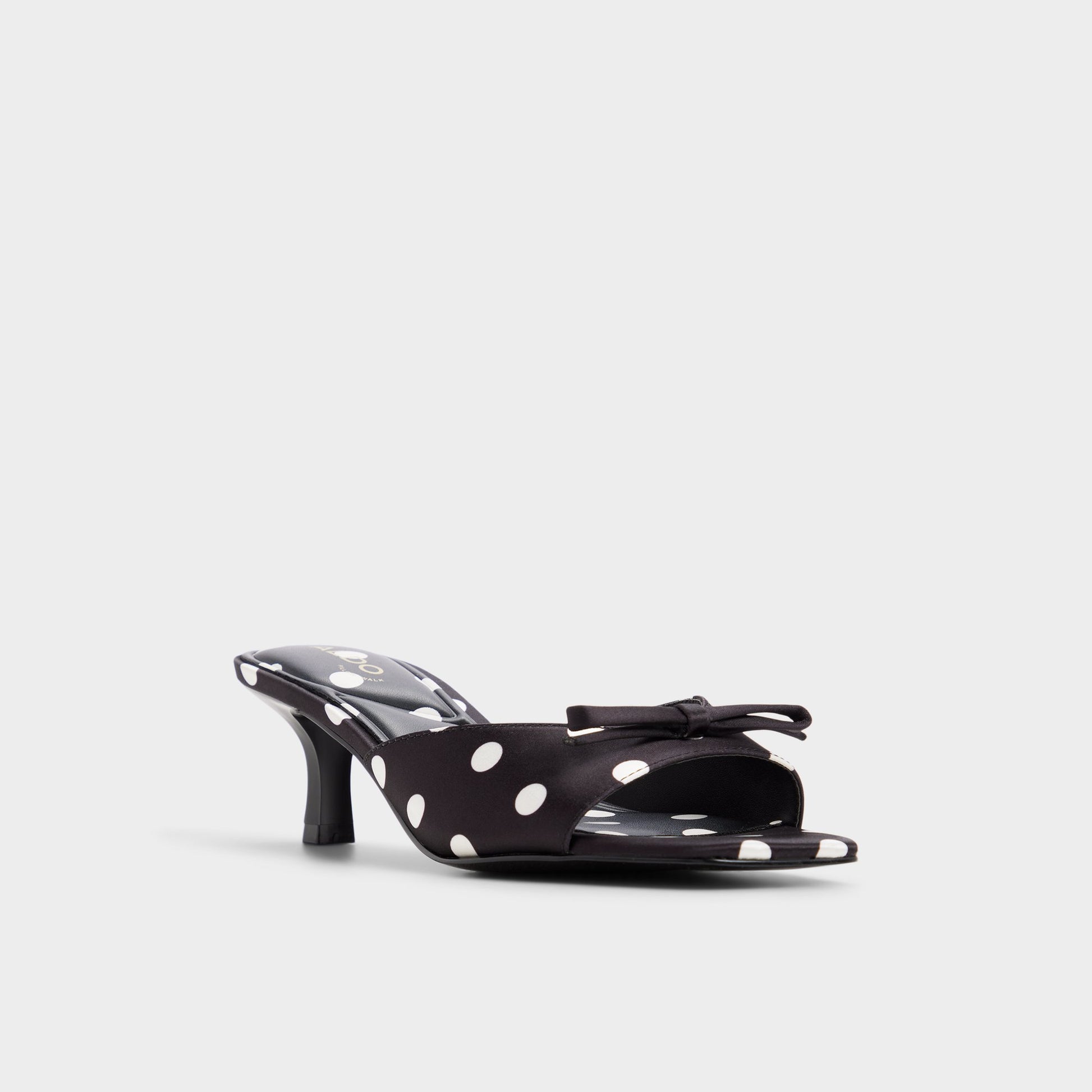 Three-quarter angle of Black/white Belerose Heeled mule's front side