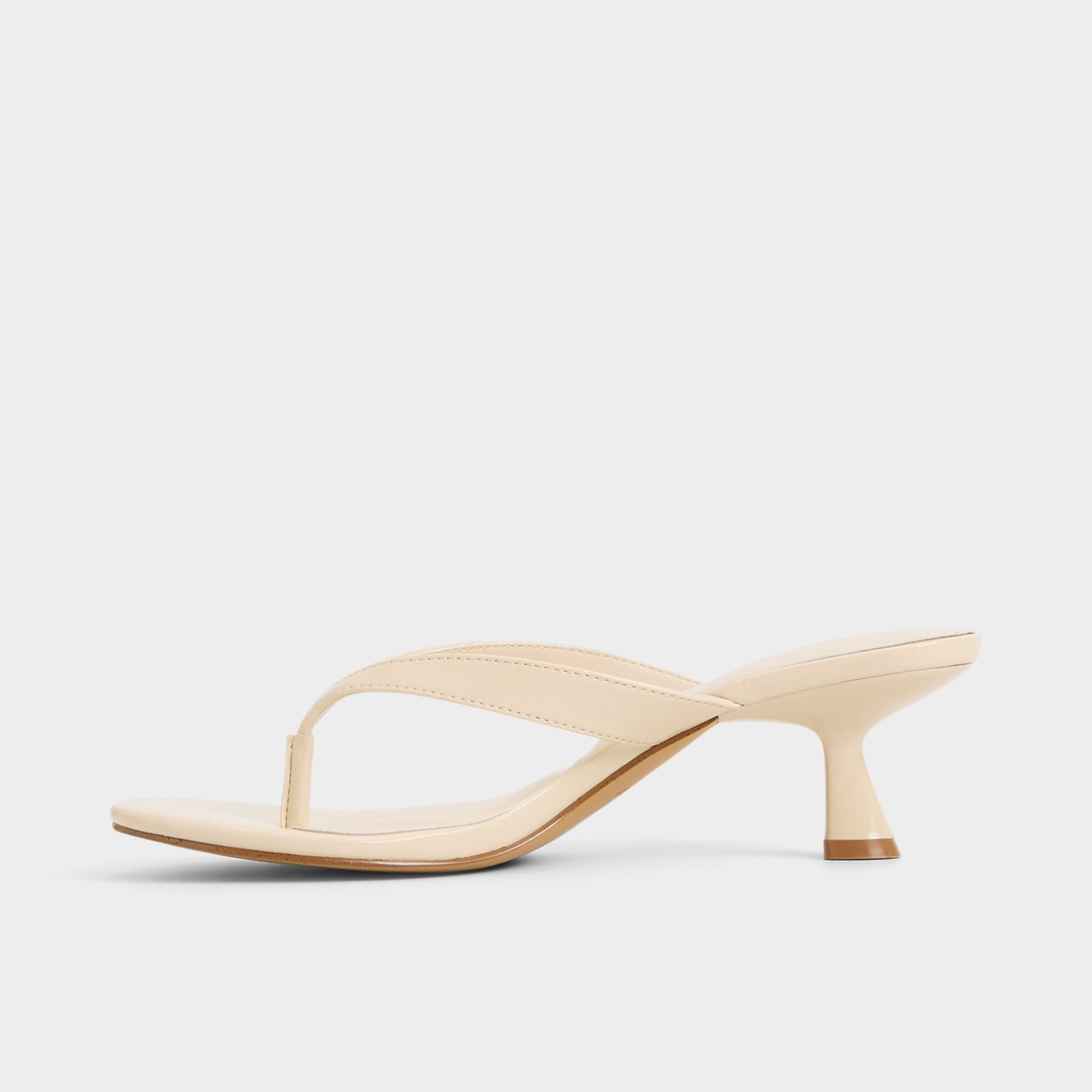 Side view of Cream Jump Heeled flip flop