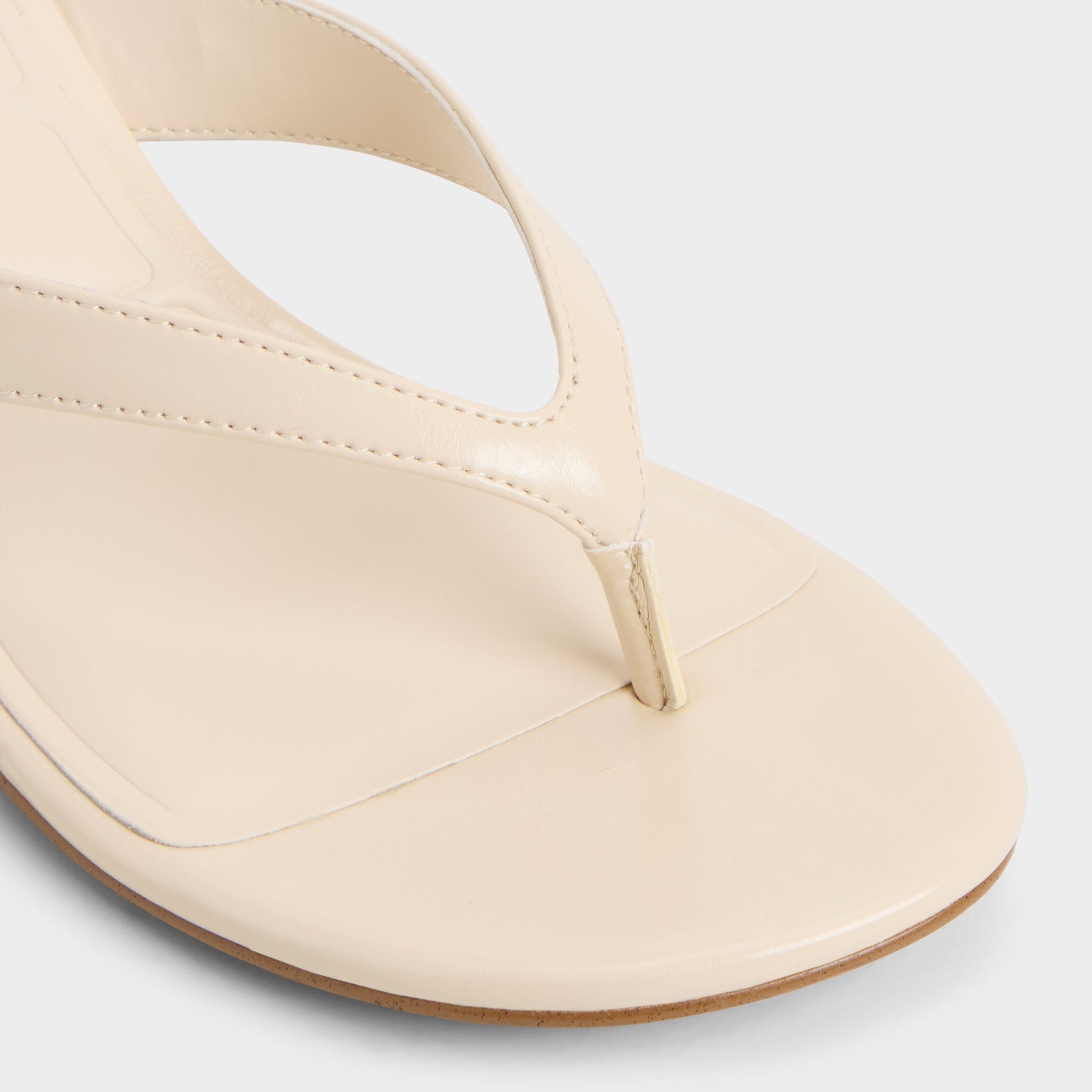 Close-up of the Cream Jump Heeled flip flop