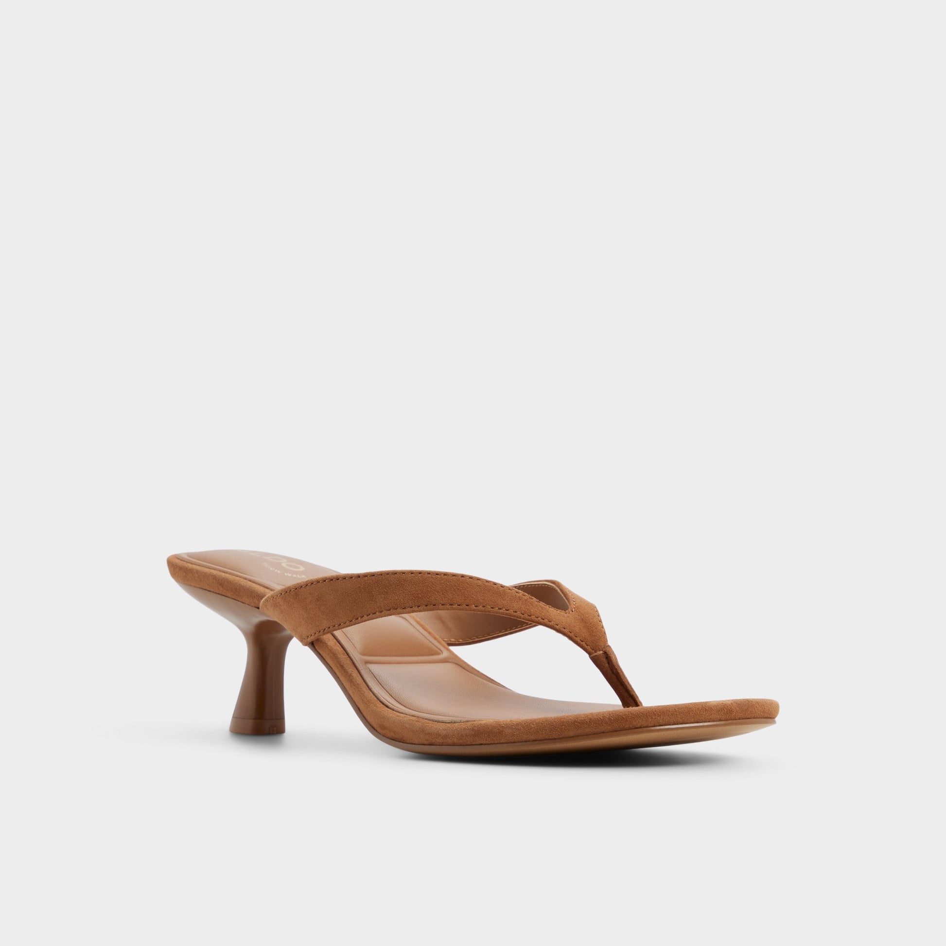 Three-quarter angle of Medium brown Jump Heeled flip flop's front side