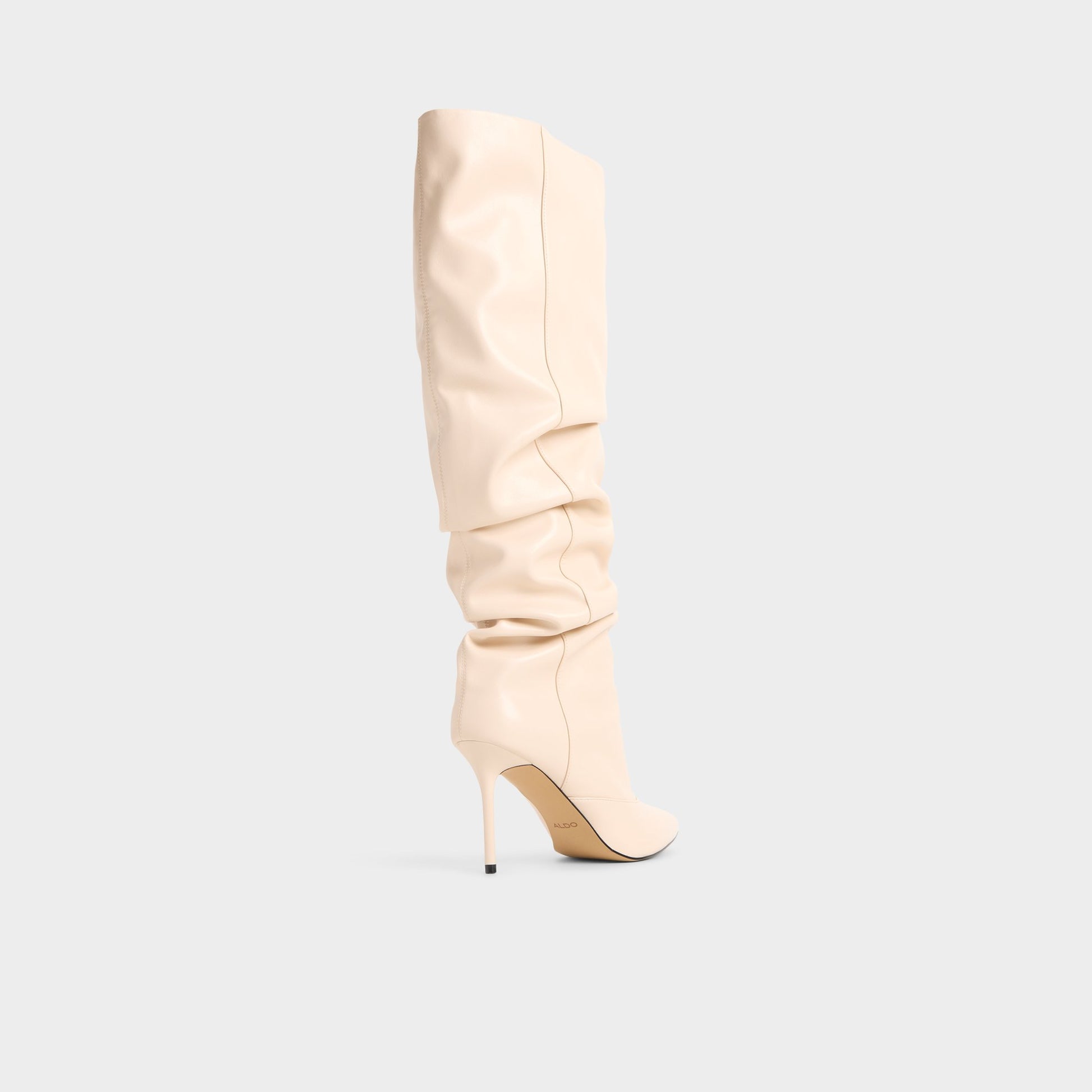 Three-quarter angle of Cream Daroba Over-the-knee boot's back side