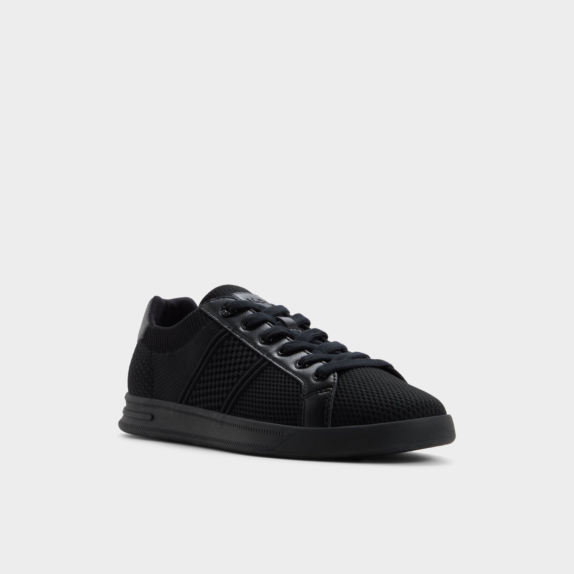 Three-quarter angle of Black Joshy Low top sneaker's front side