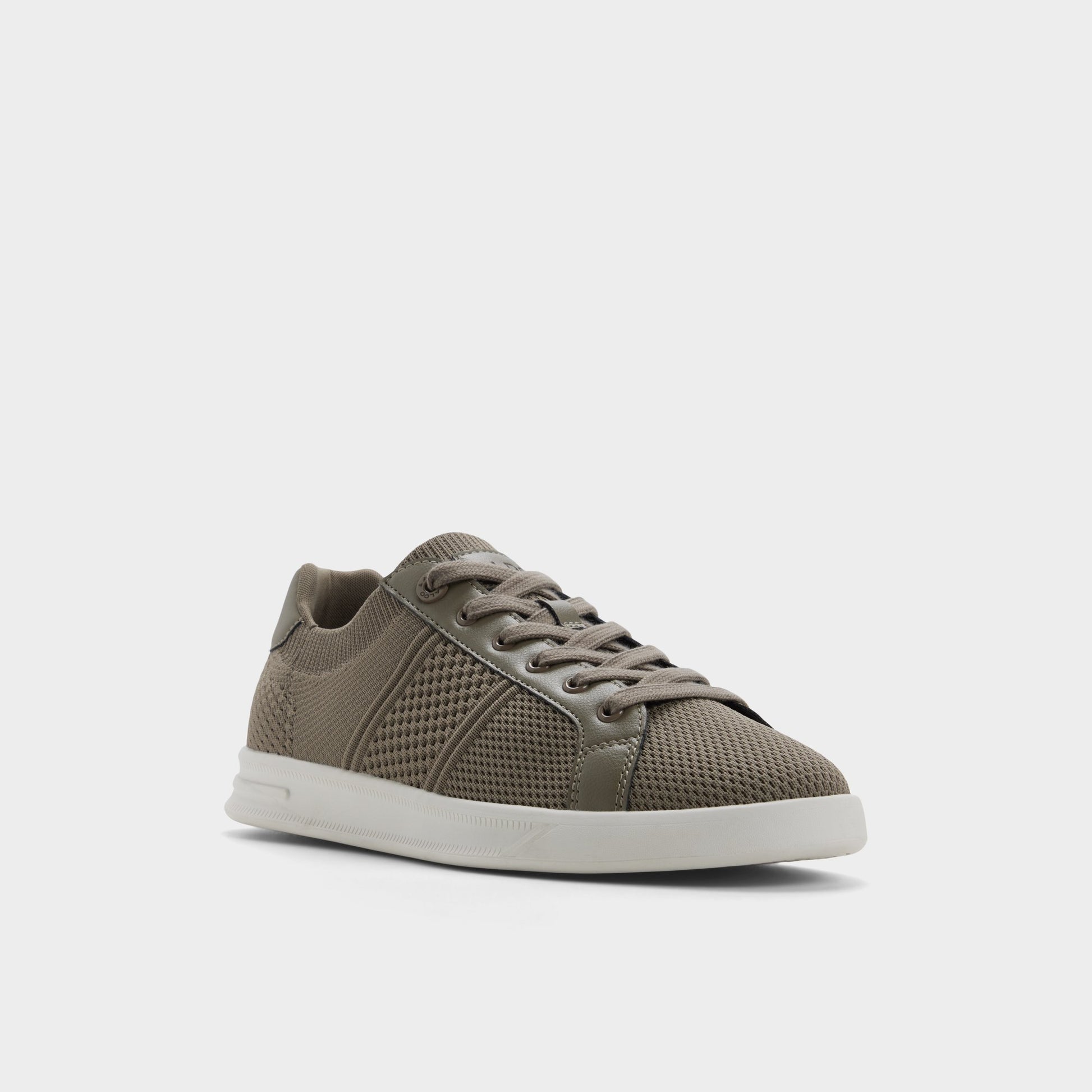 Three-quarter angle of Dark brown Joshy Low top sneaker's front side
