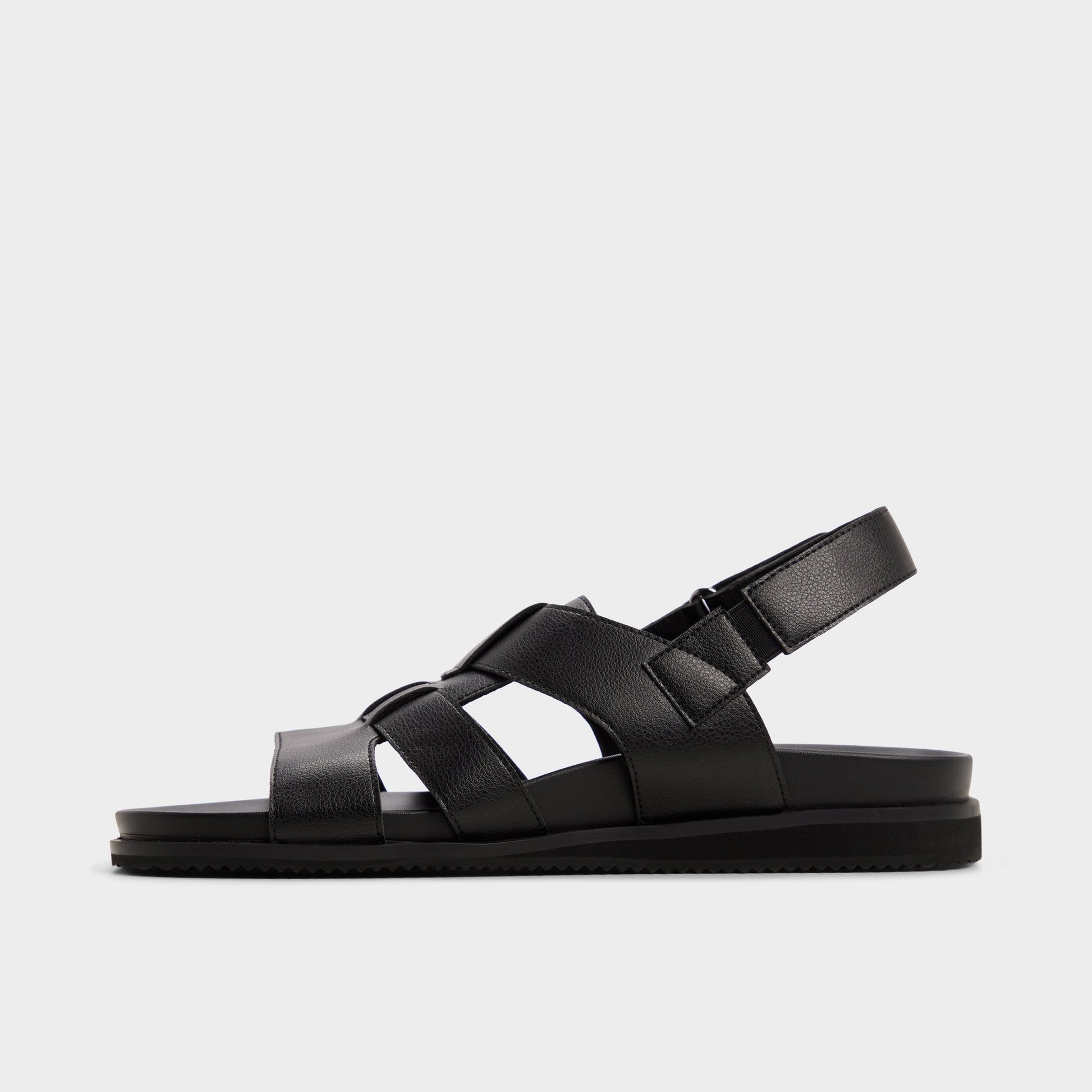 Side view of Black/black Nuno Strappy flat sandal