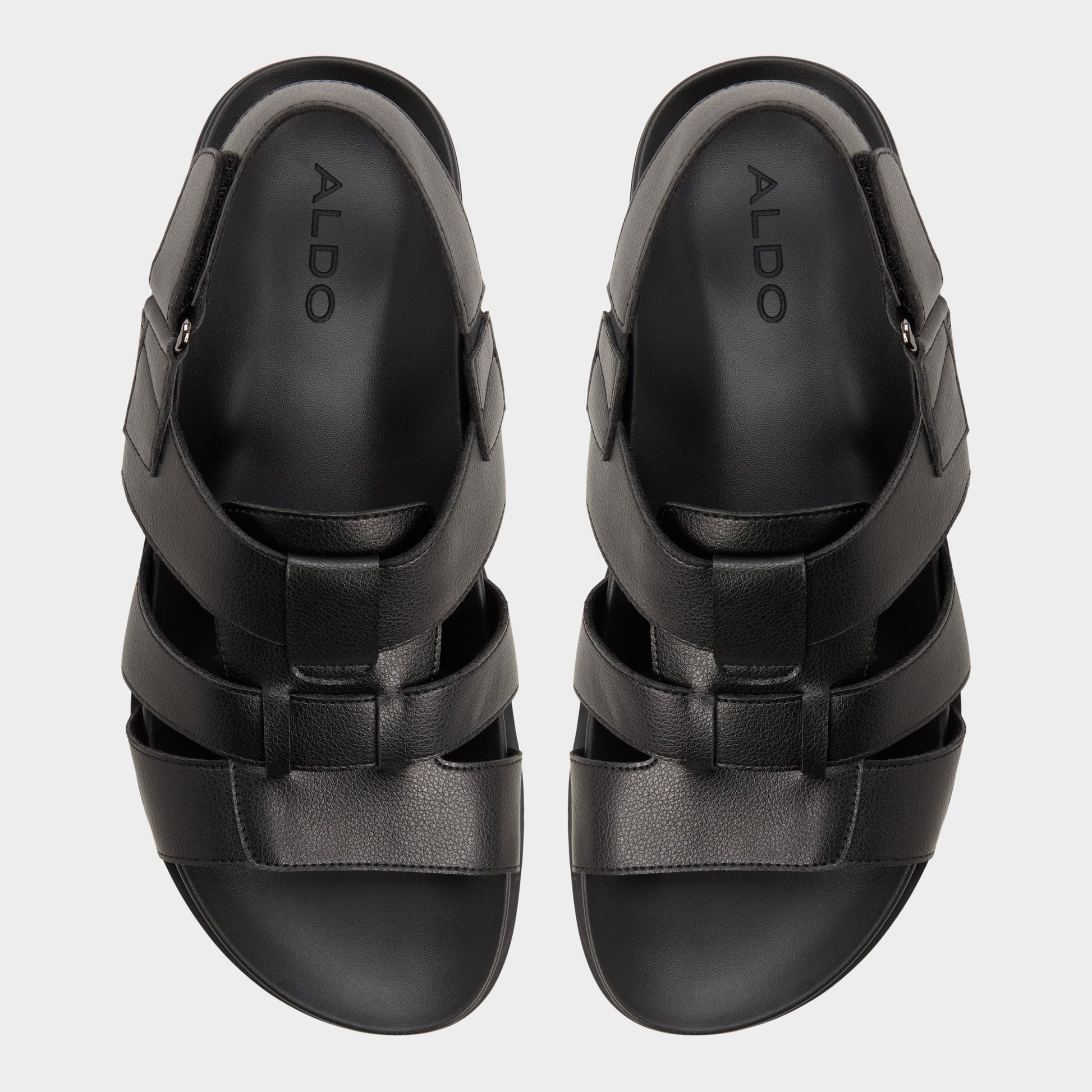 Top-down view of the Black/black Nuno Strappy flat sandal