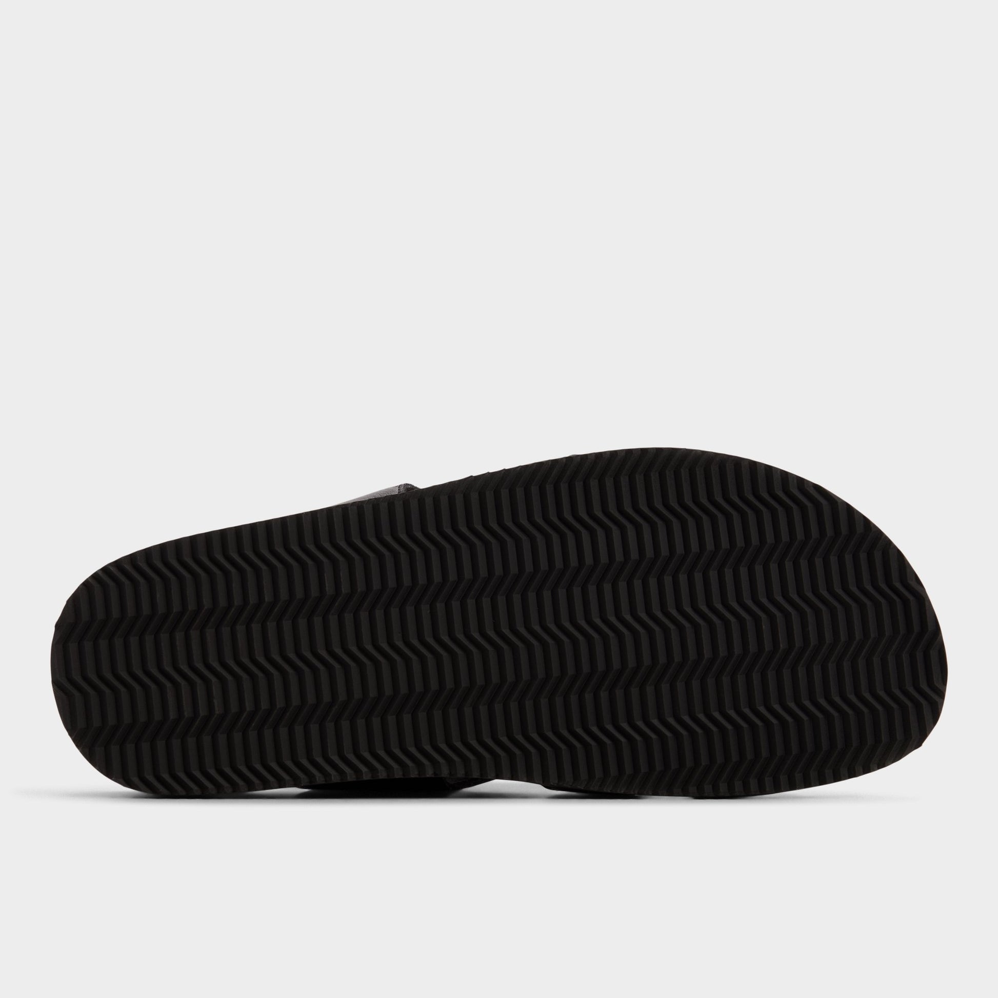 View of Black/black Nuno Strappy flat sandal's sole