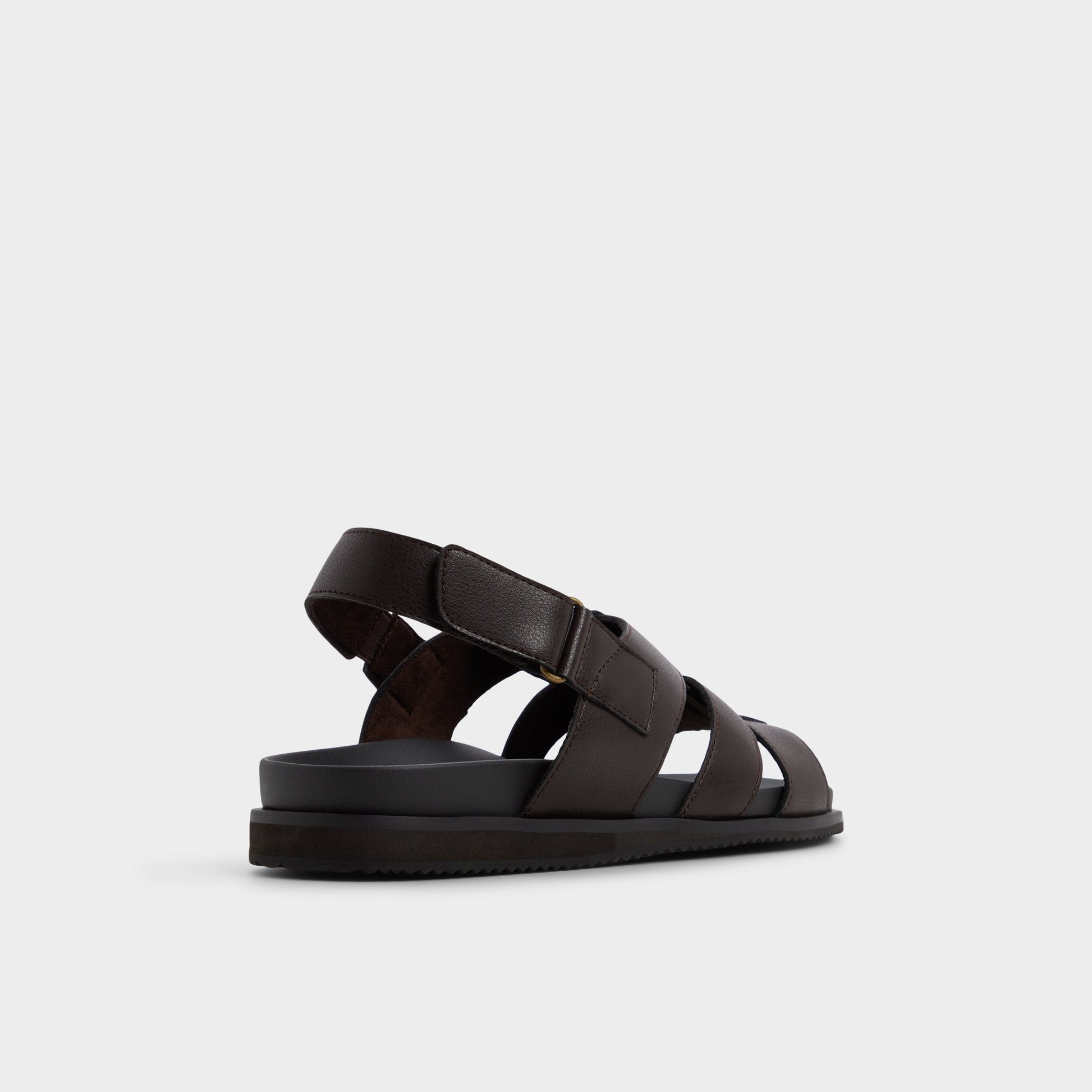 Three-quarter angle of Dark brown Nuno Strappy flat sandal's back side