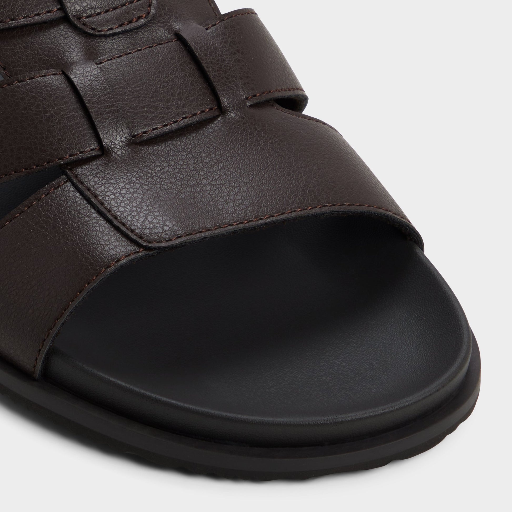 Close-up of the Dark brown Nuno Strappy flat sandal